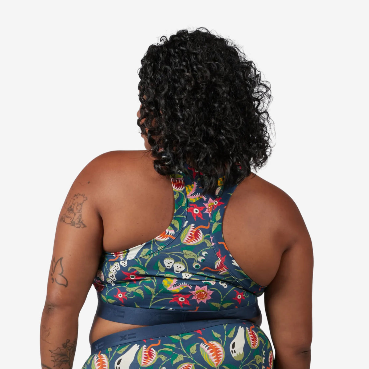 Model: Maliyah is 5'7" and wears a 2X
