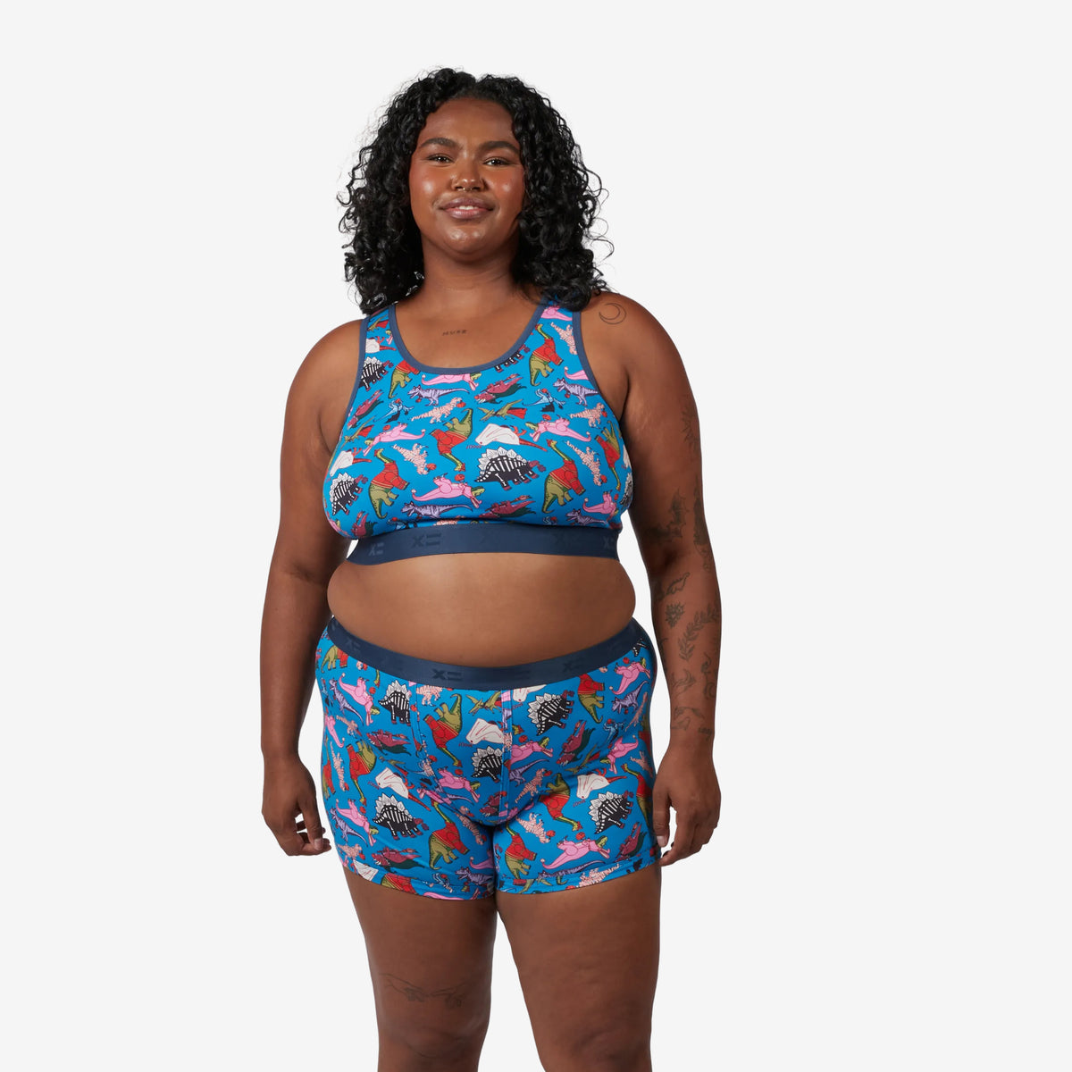 Model: Maliyah is 5'7" and wears a 2X