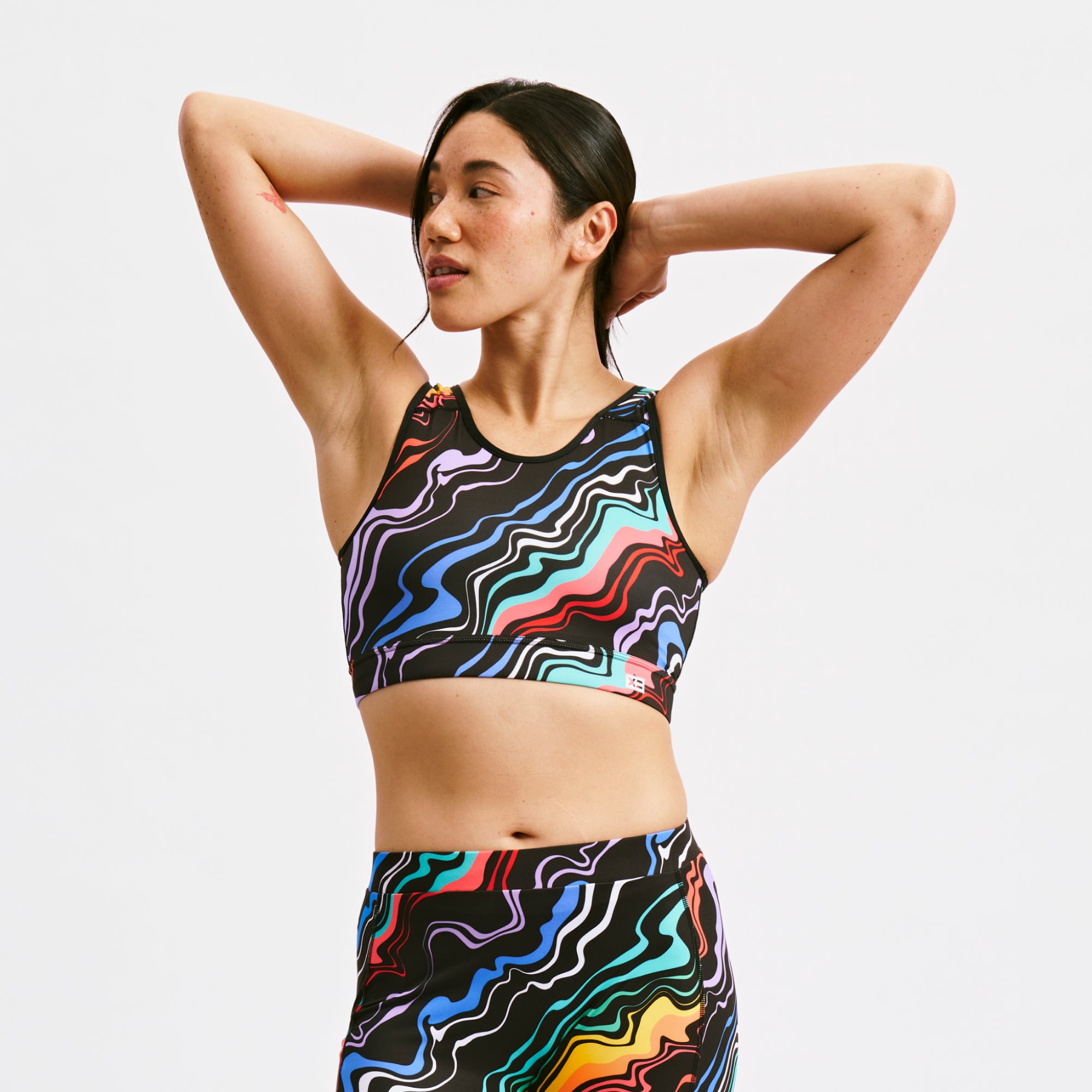 Model:Kia is 5'7" and wears a medium