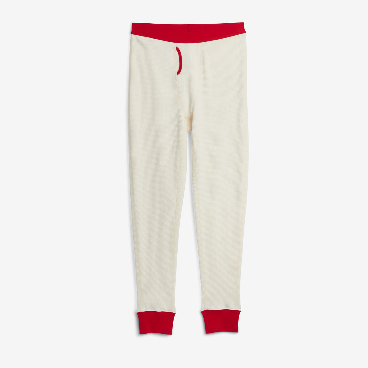 Cream modal cloud waffle pants with a red waistband and red ribbed ankle cuffs, shown flat on a light gray background.