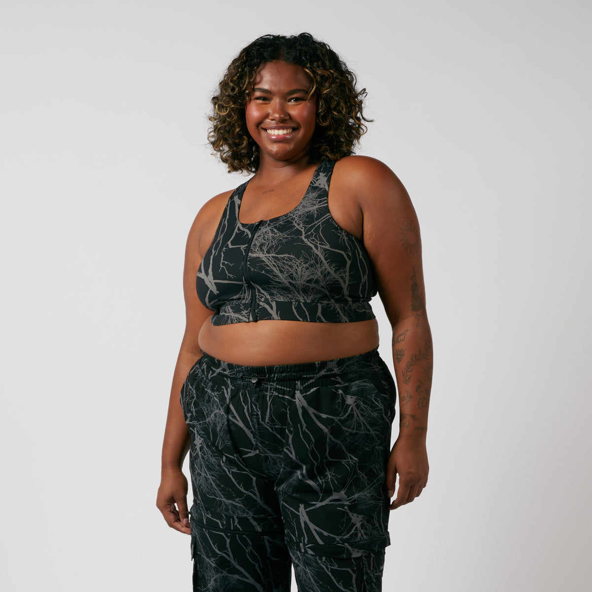 Model: Maliyah is 5'7" and wears a 2X