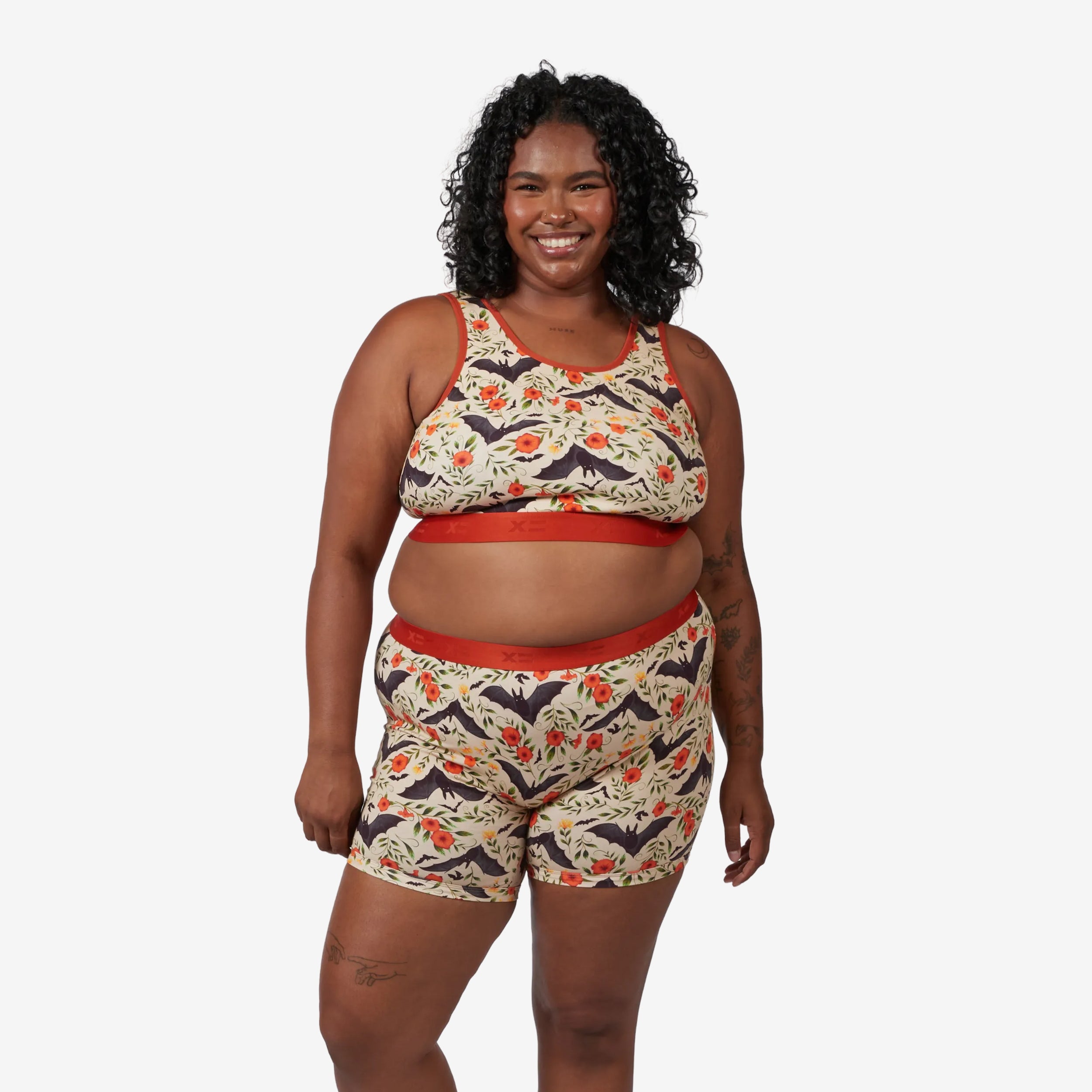 Model: Maliyah is 5'7" and wears a 2X