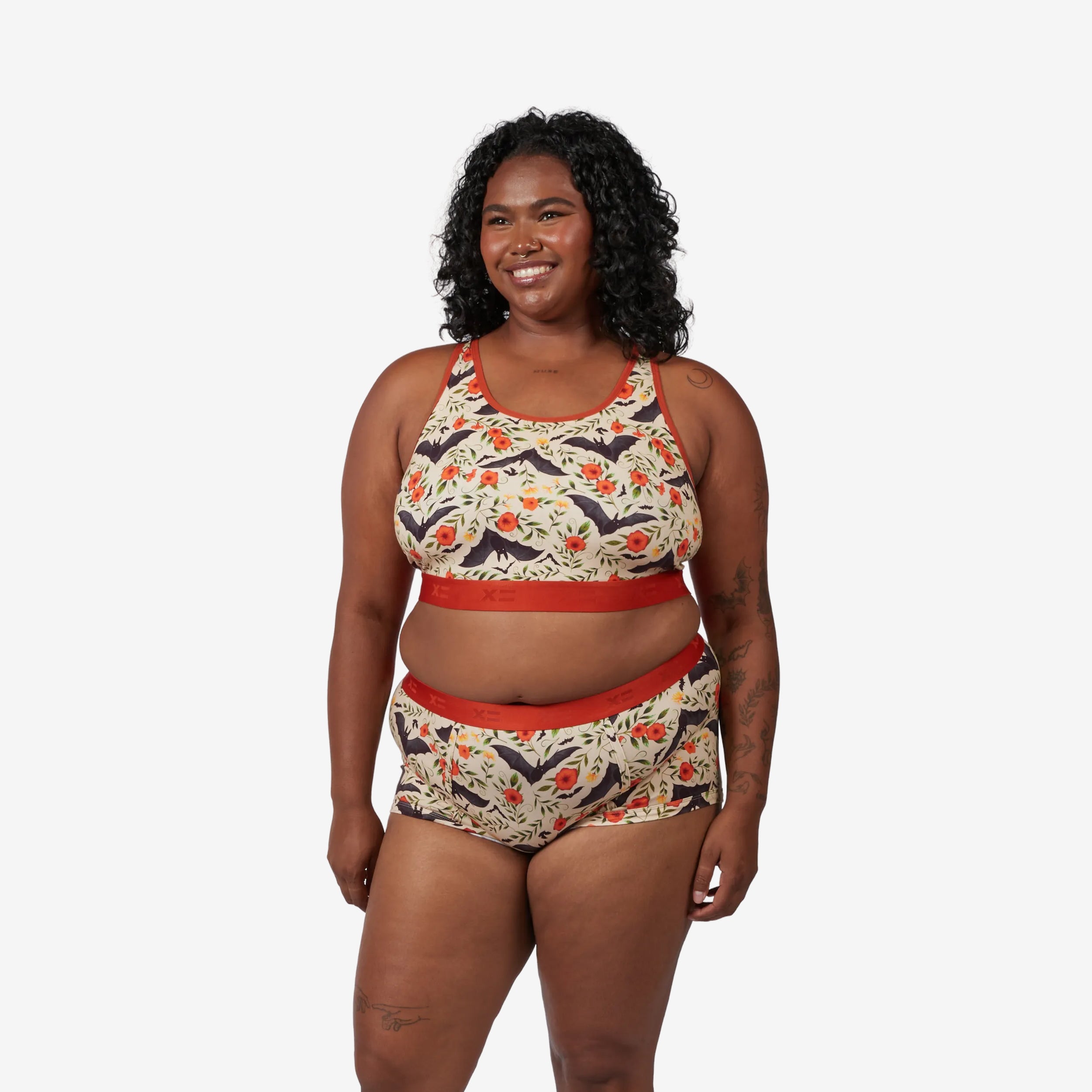 Model: Maliyah is 5'7" and wears a 2X