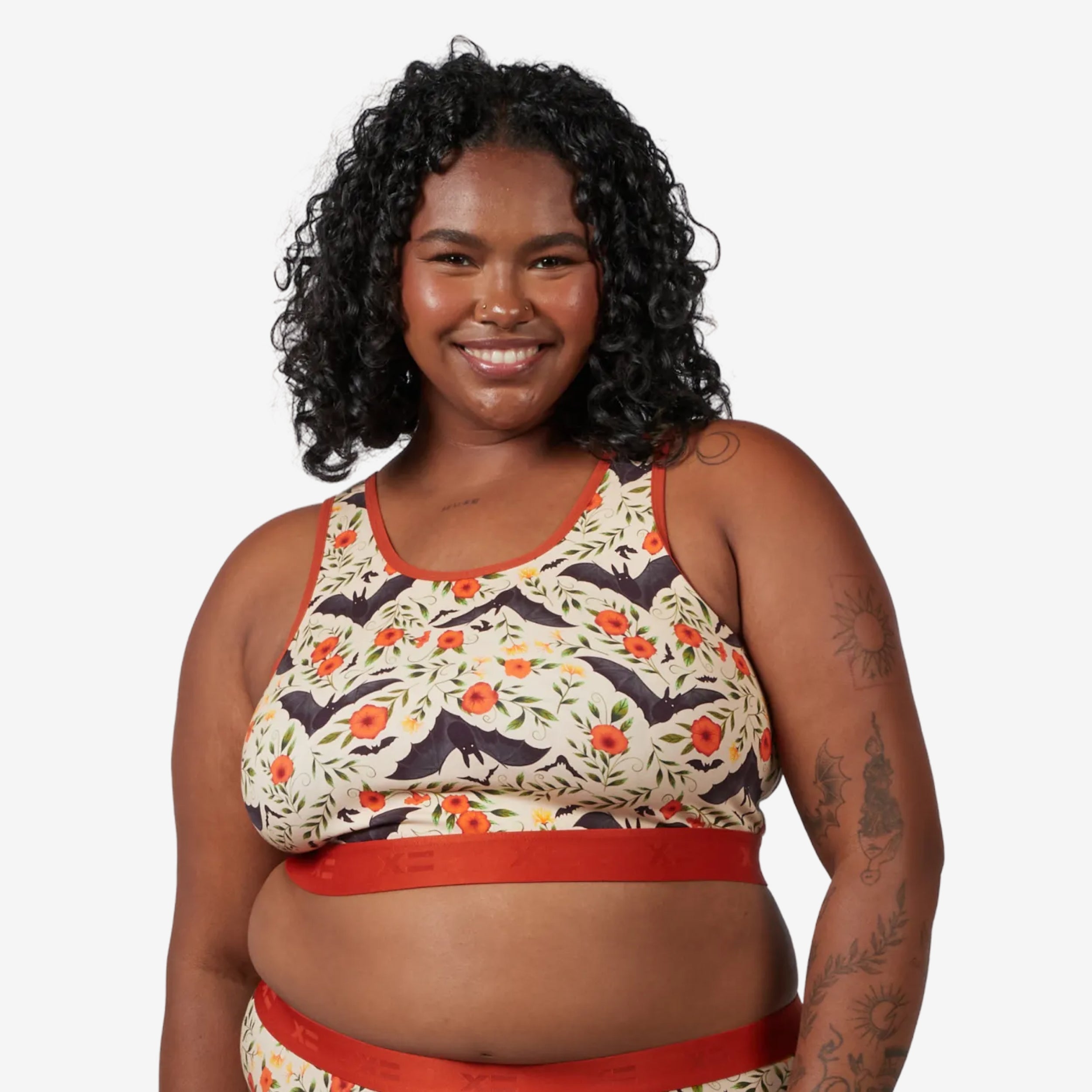 Model: Maliyah is 5'7" and wears a 2X