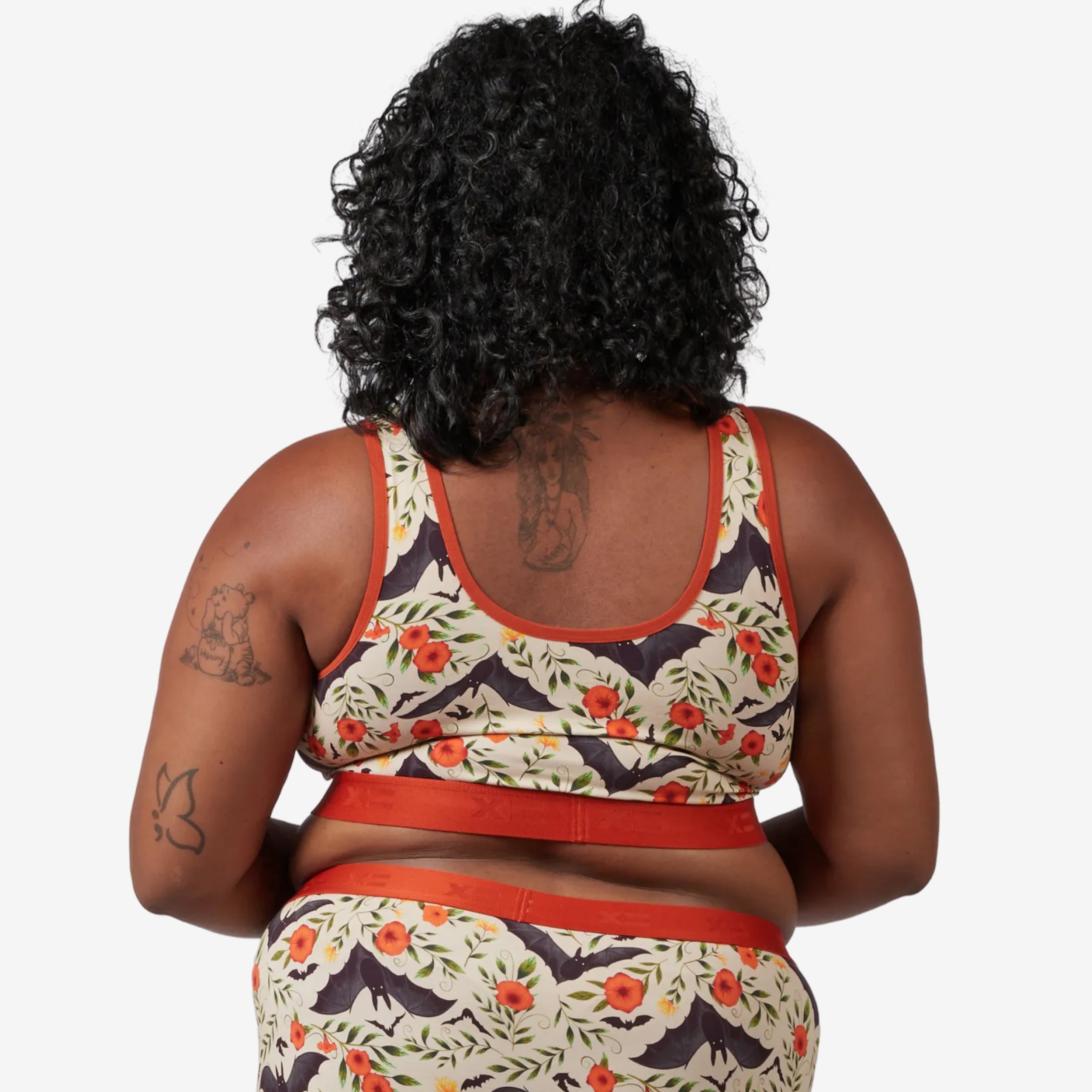 Model: Maliyah is 5'7" and wears a 2X