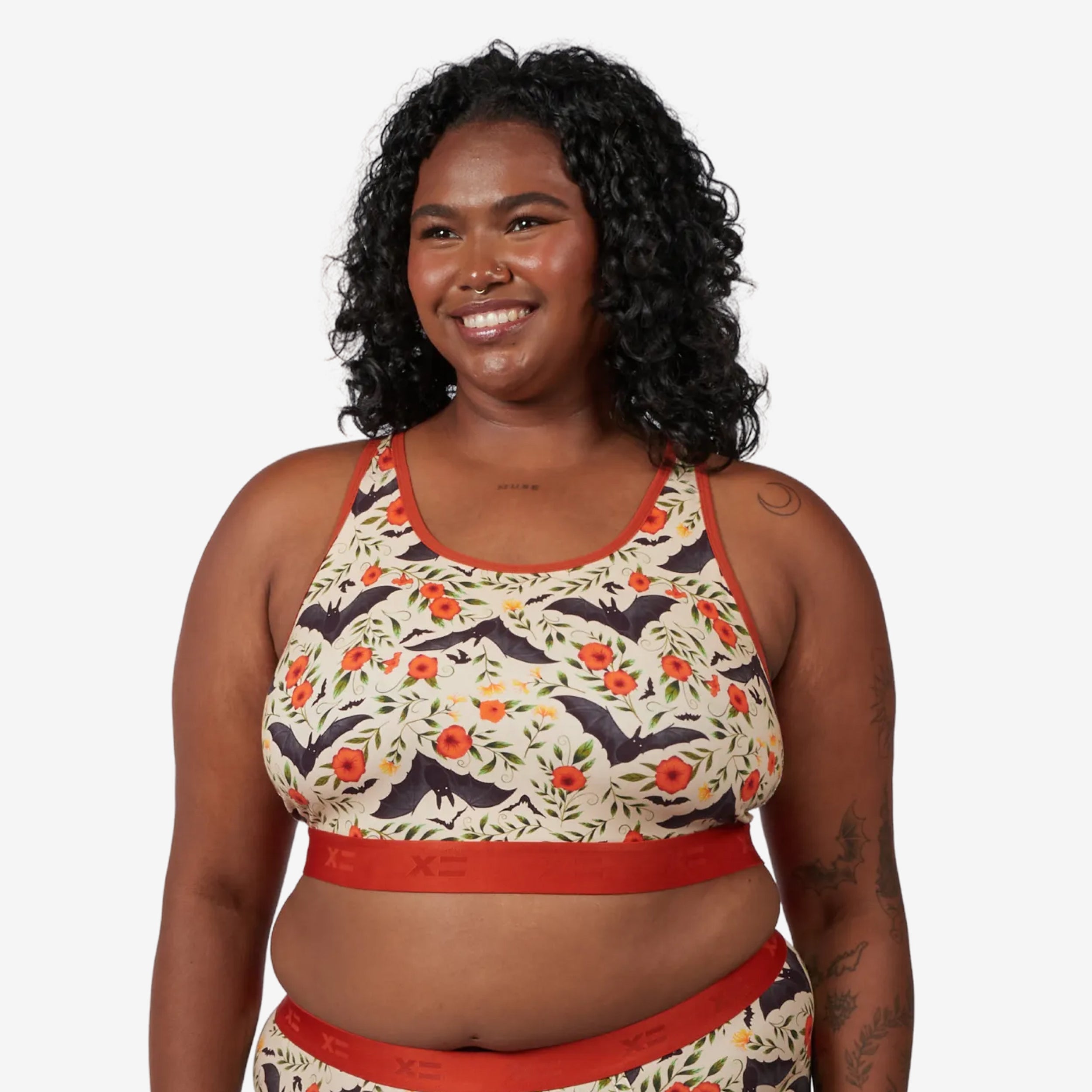 Model: Maliyah is 5'7" and wears a 2X