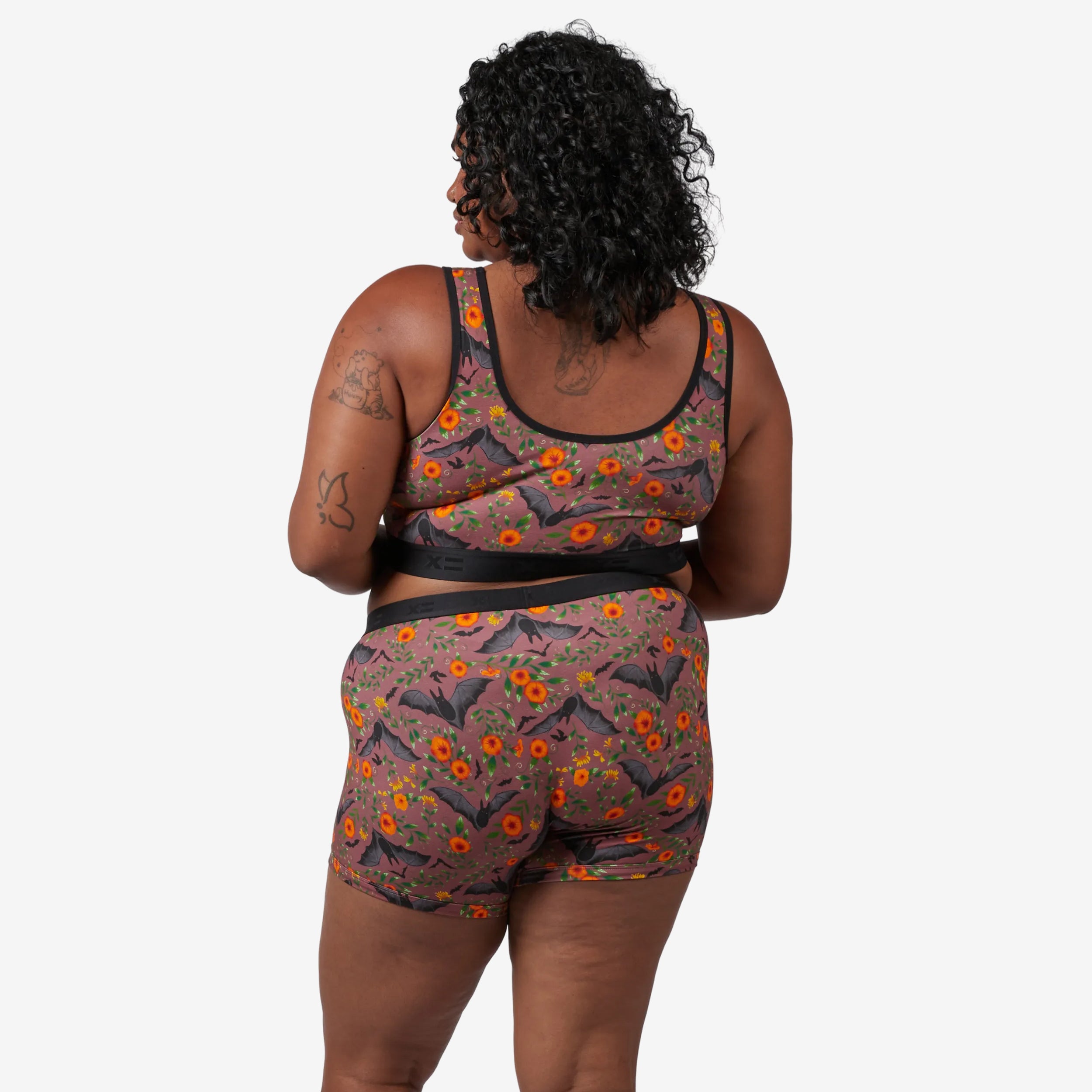 Model: Maliyah is 5'7" and wears a 2X
