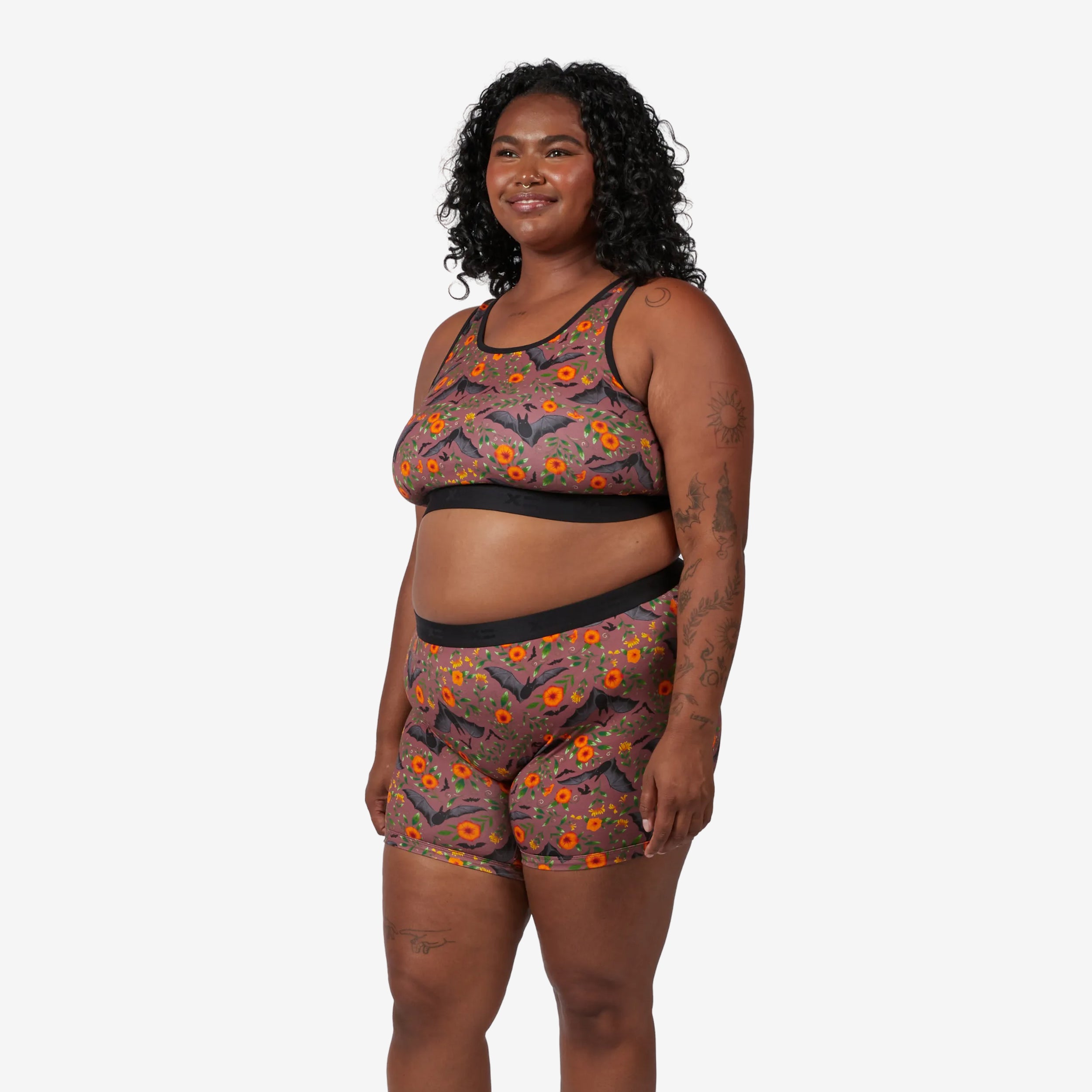 Model: Maliyah is 5'7" and wears a 2X