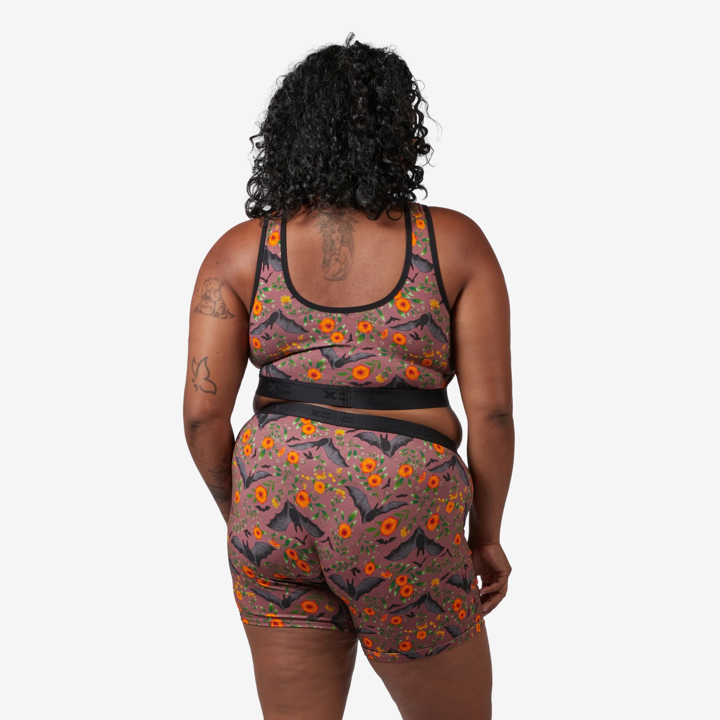 Model: Maliyah is 5'7" and wears a 2X