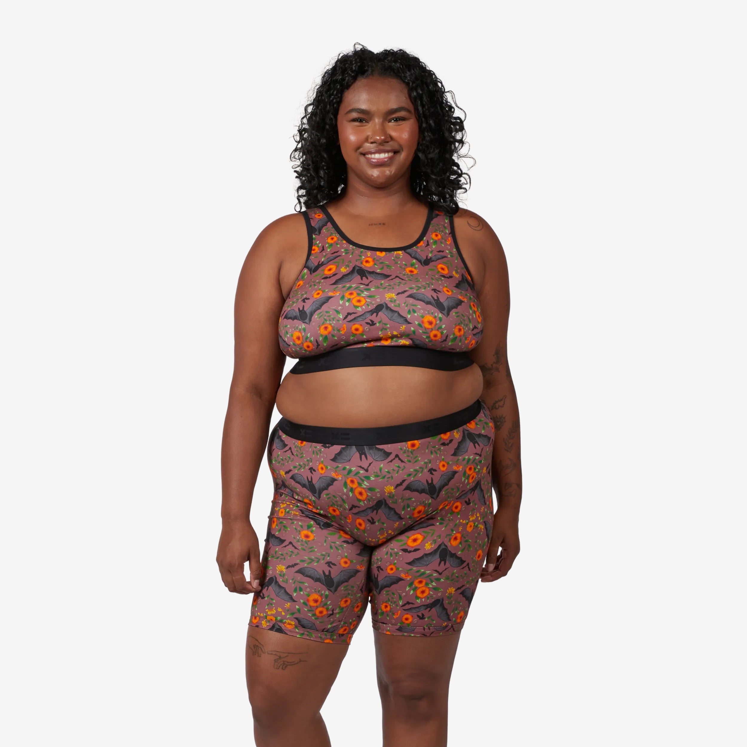 Model: Maliyah is 5'7" and wears a 2X
