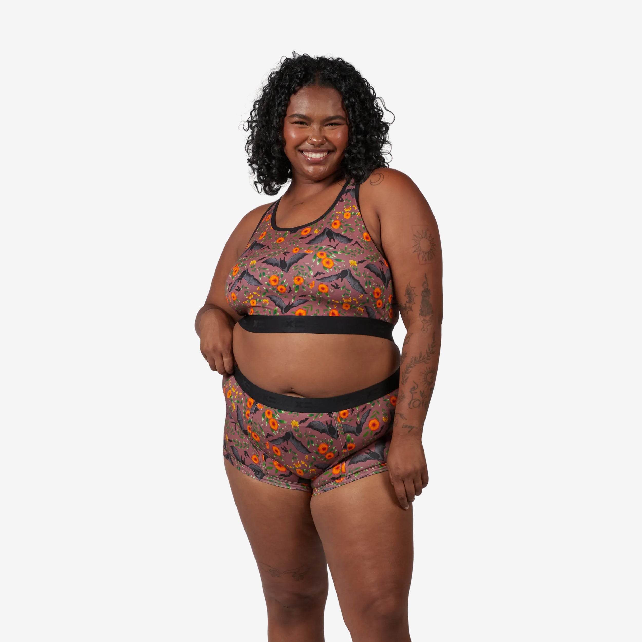 Model: Maliyah is 5'7" and wears a 2X