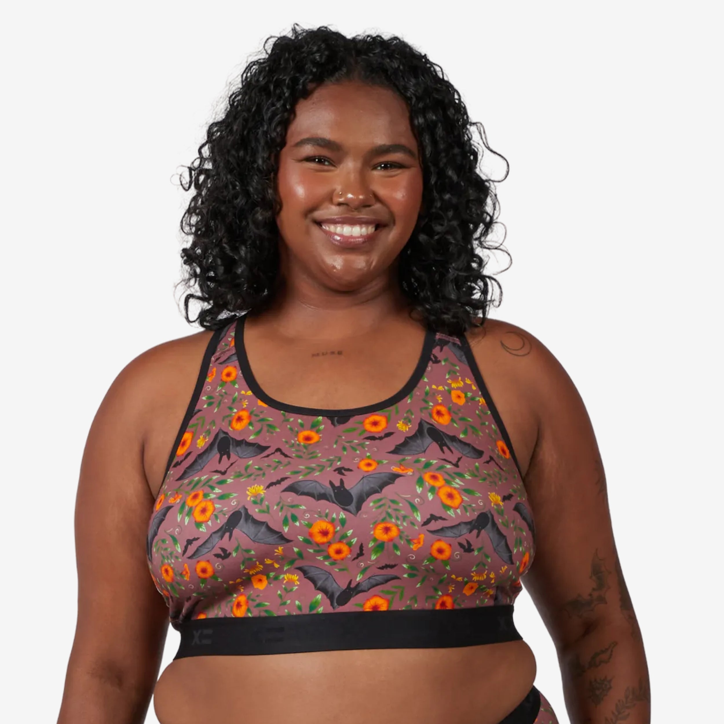 Model: Maliyah is 5'7" and wears a 2X