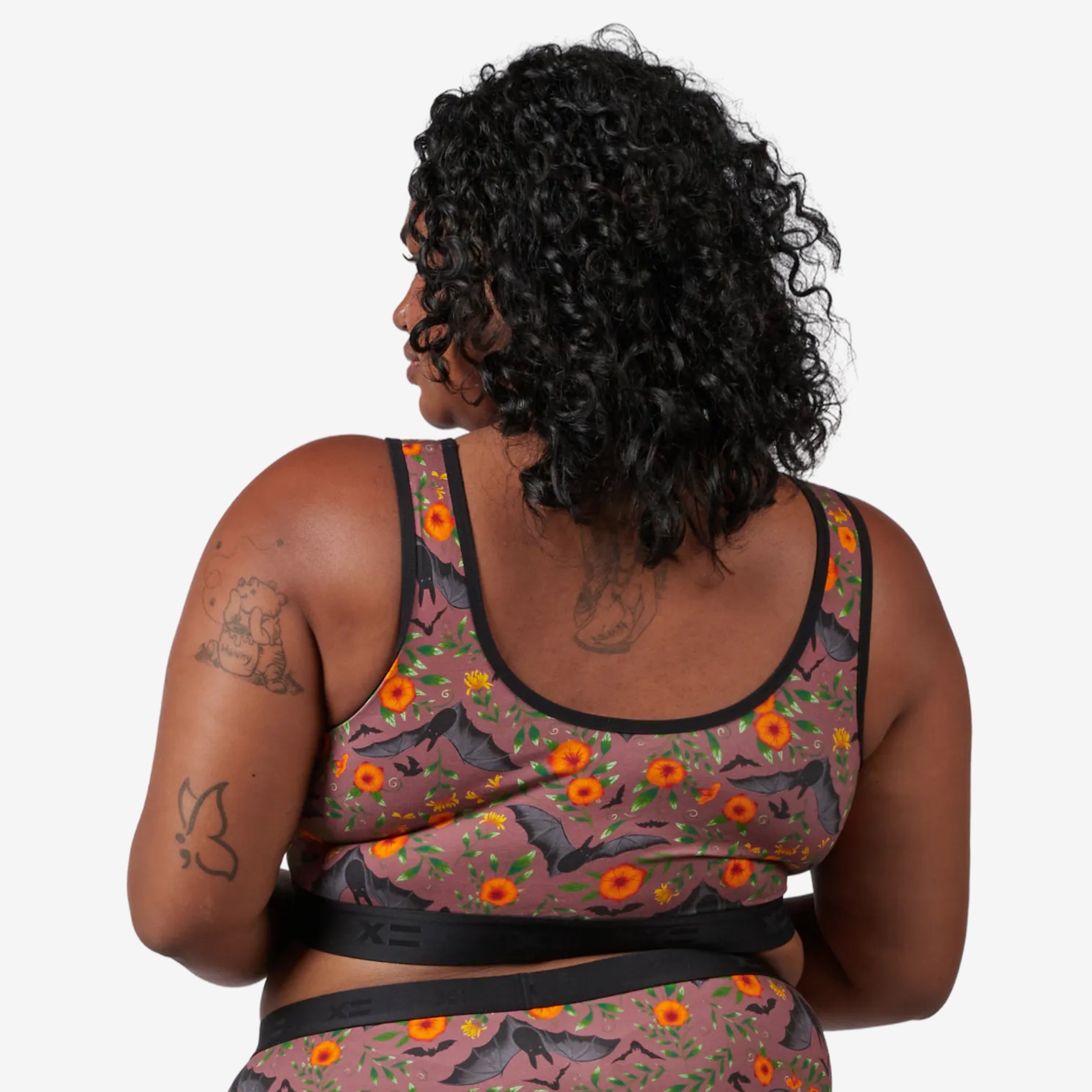 Model: Maliyah is 5'7" and wears a 2X