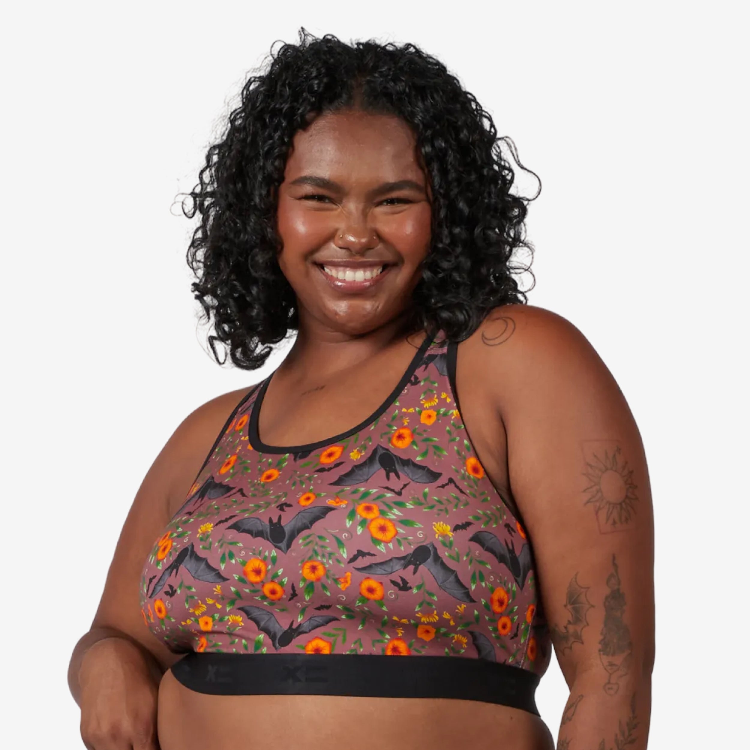 Model: Maliyah is 5'7" and wears a 2X