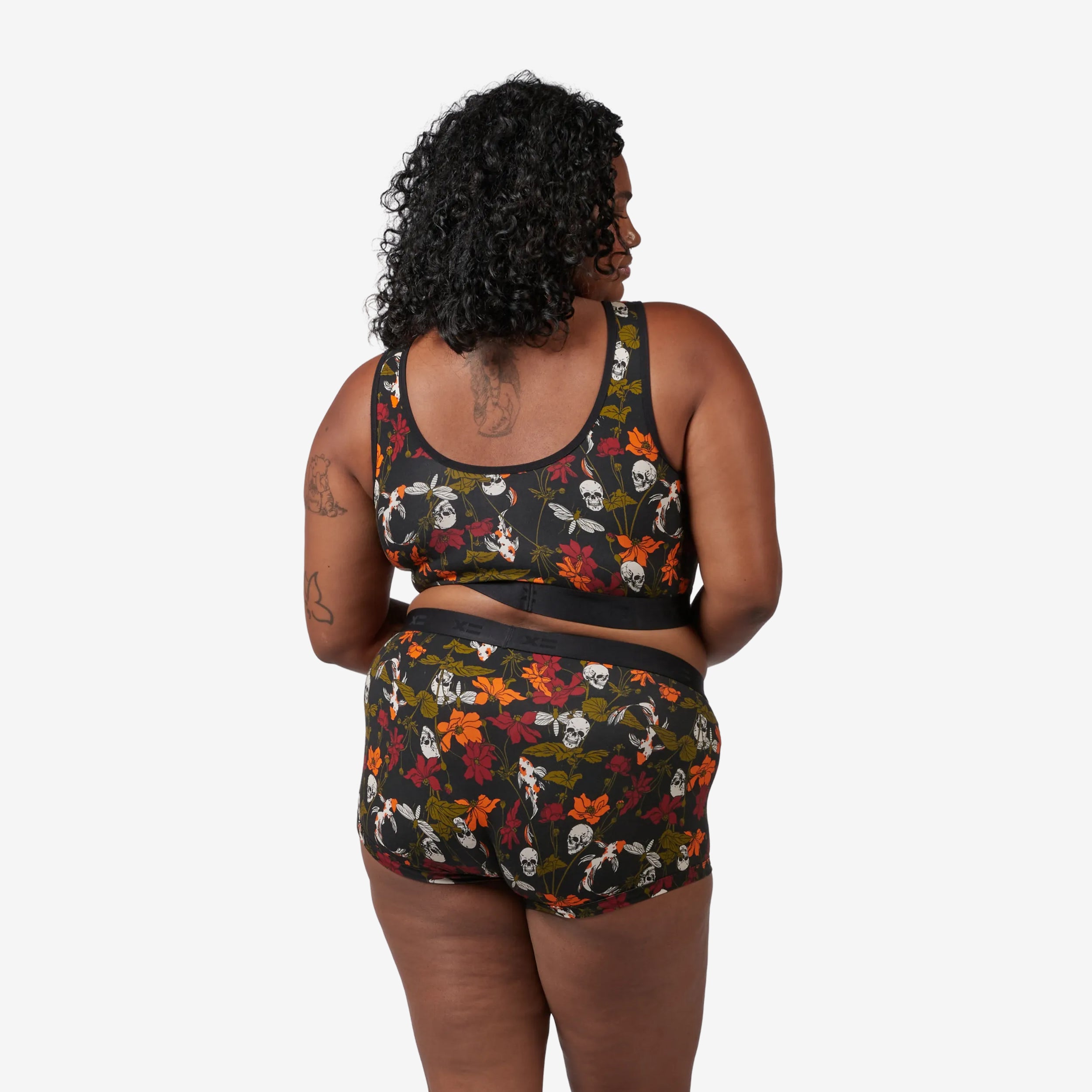 Model: Maliyah is 5'7" and wears a 2X