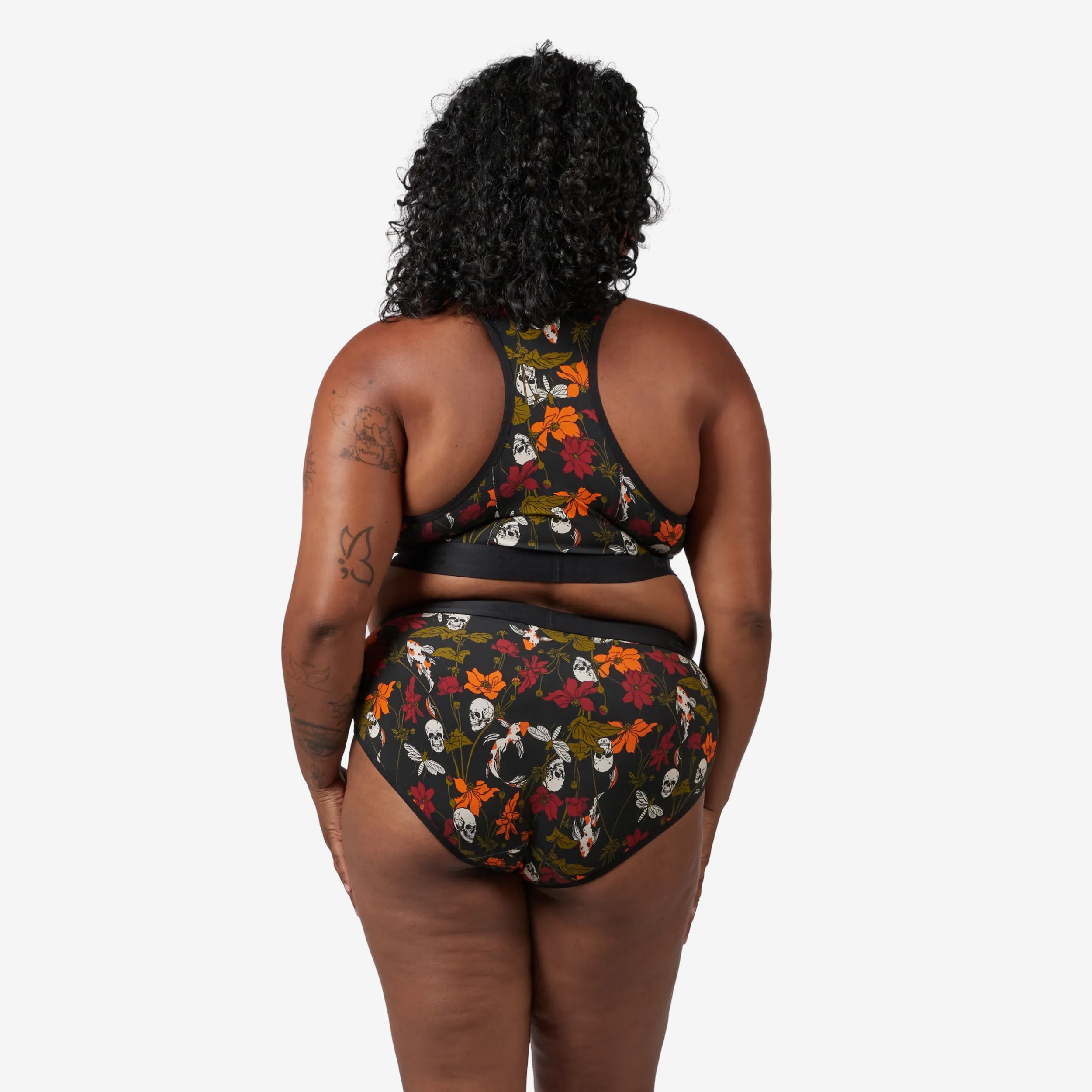 Model: Maliyah is 5'7" and wears a 2X