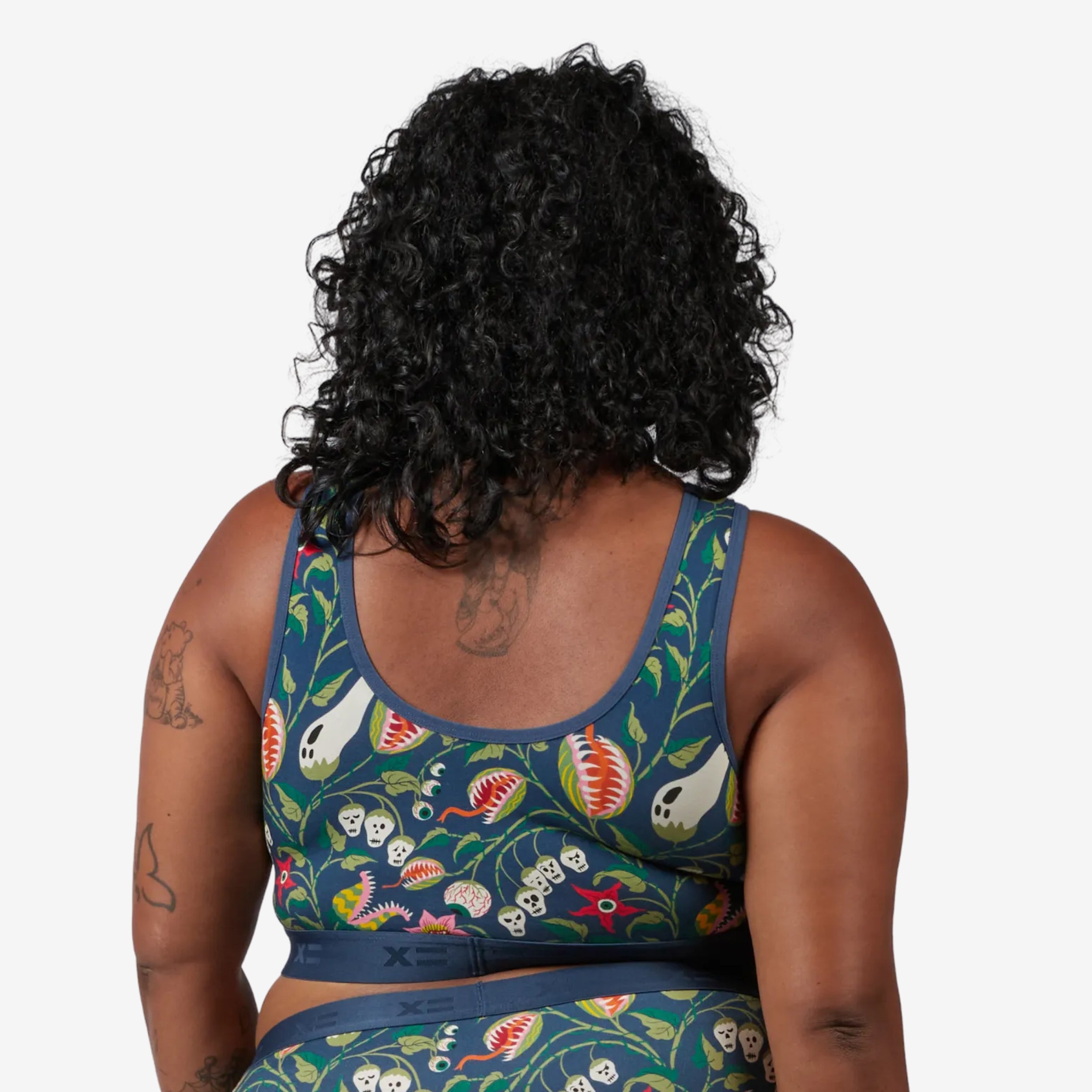 Model: Maliyah is 5'7" and wears a 2X
