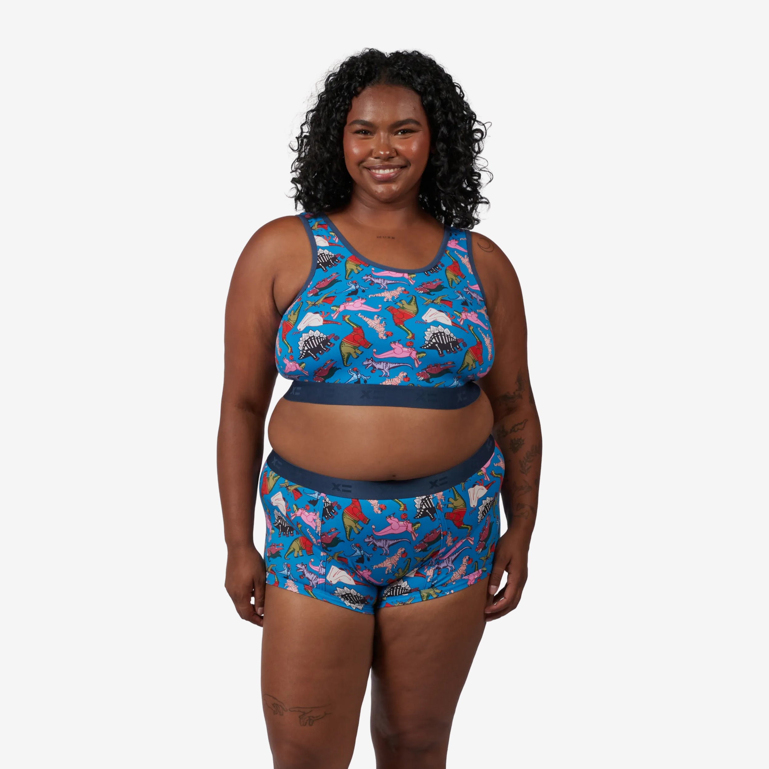 Model: Maliyah is 5'7" and wears a 2X