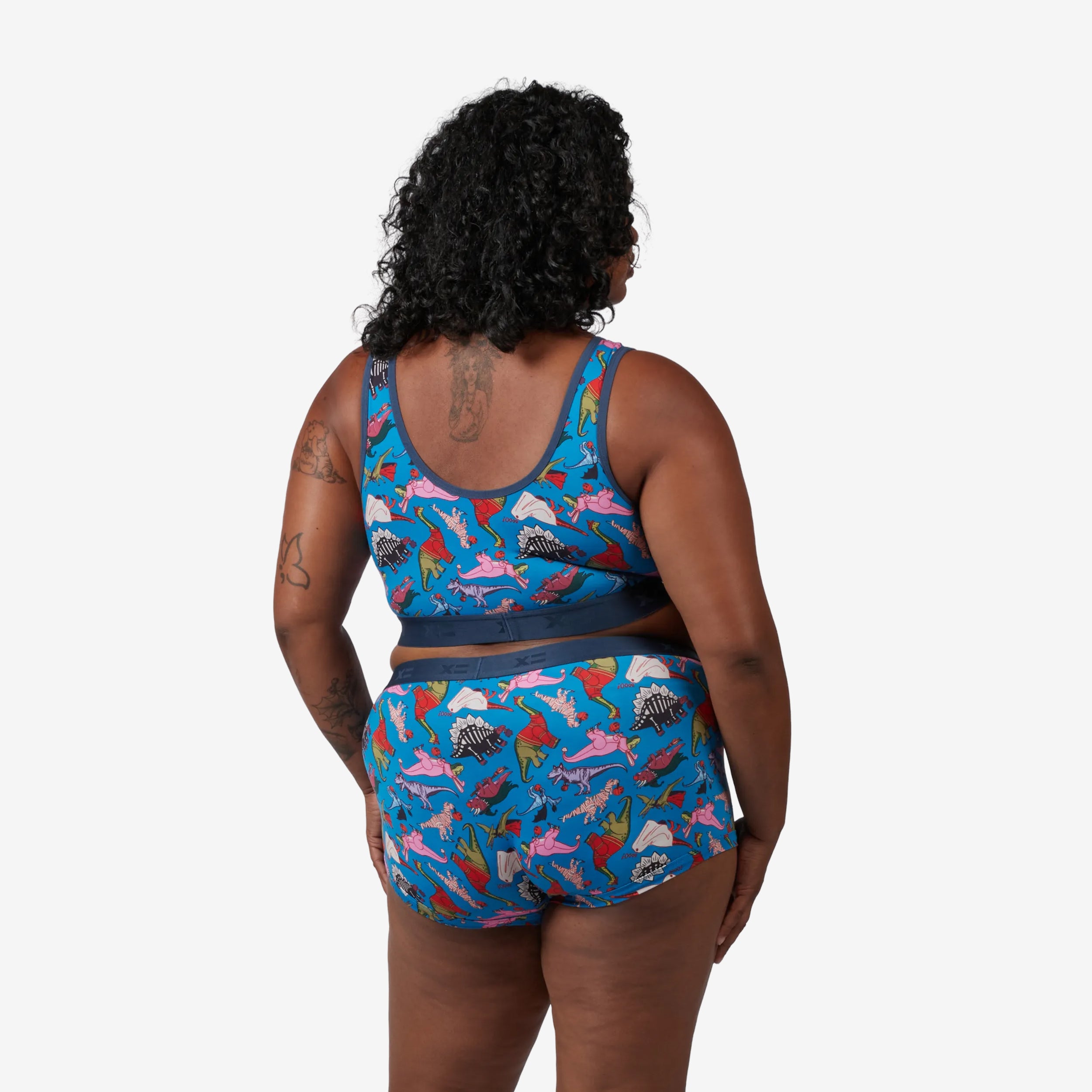 Model: Maliyah is 5'7" and wears a 2X