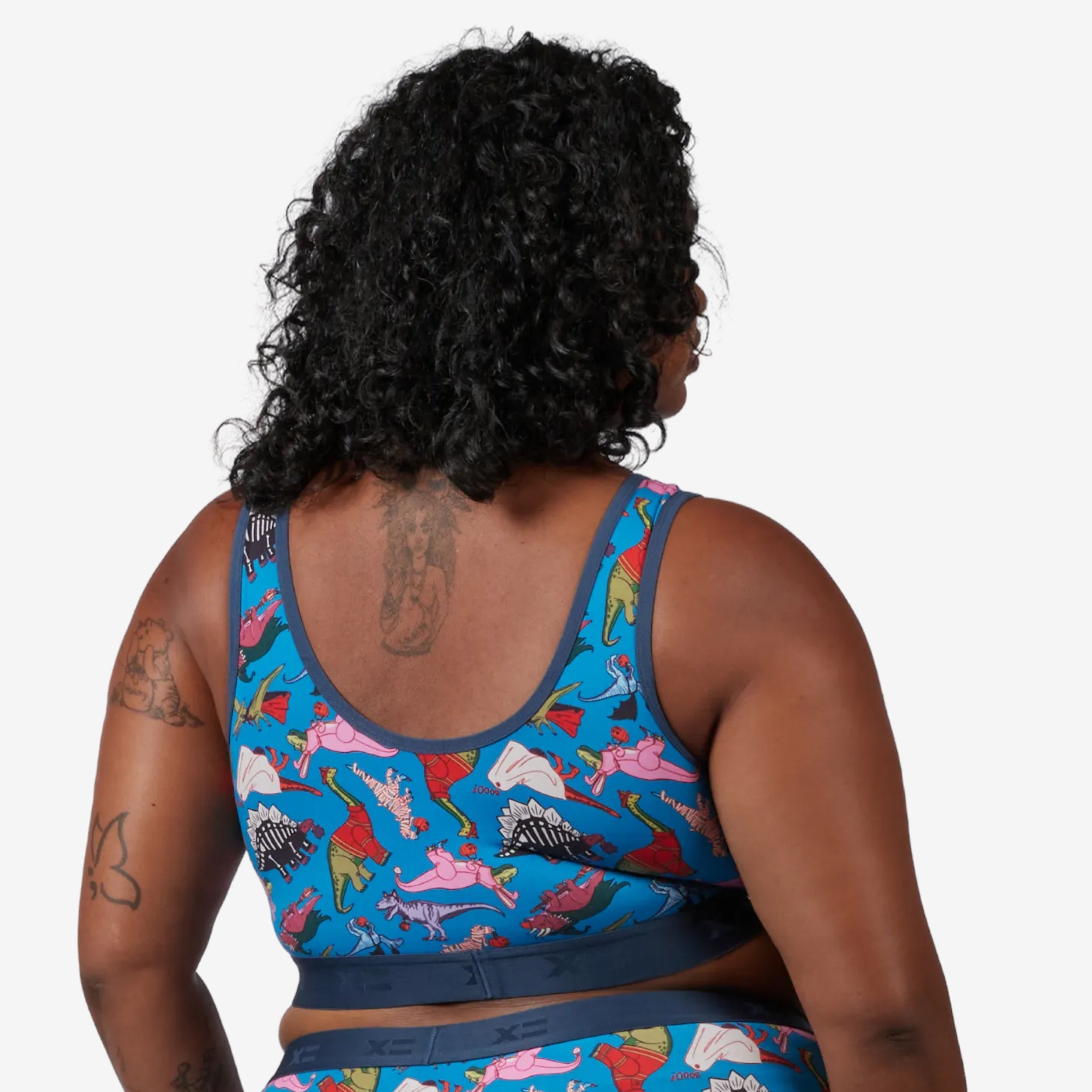 Model: Maliyah is 5'7" and wears a 2X