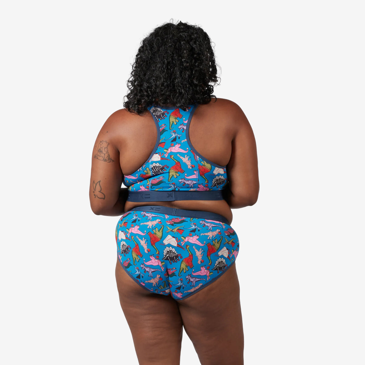 Model: Maliyah is 5'7" and wears a 2X