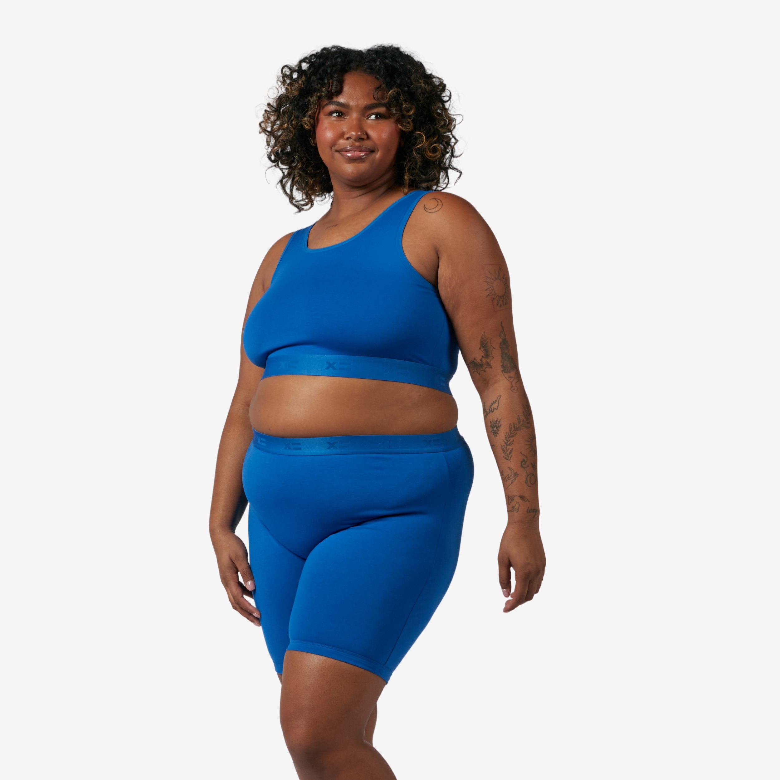 Model: Maliyah is 5'7" and wears a 2X