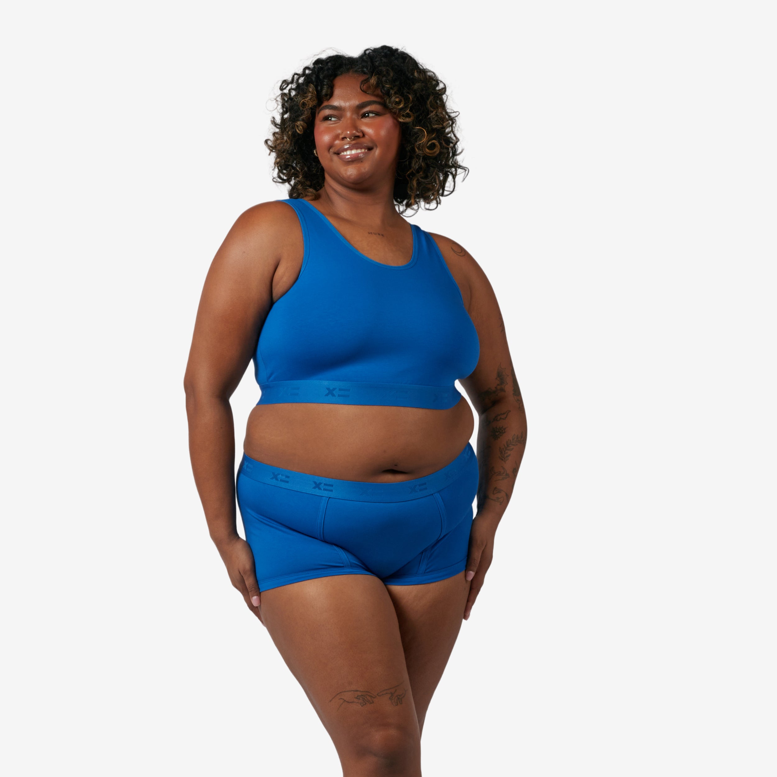 Model: Maliyah is 5'7" and wears a 2X