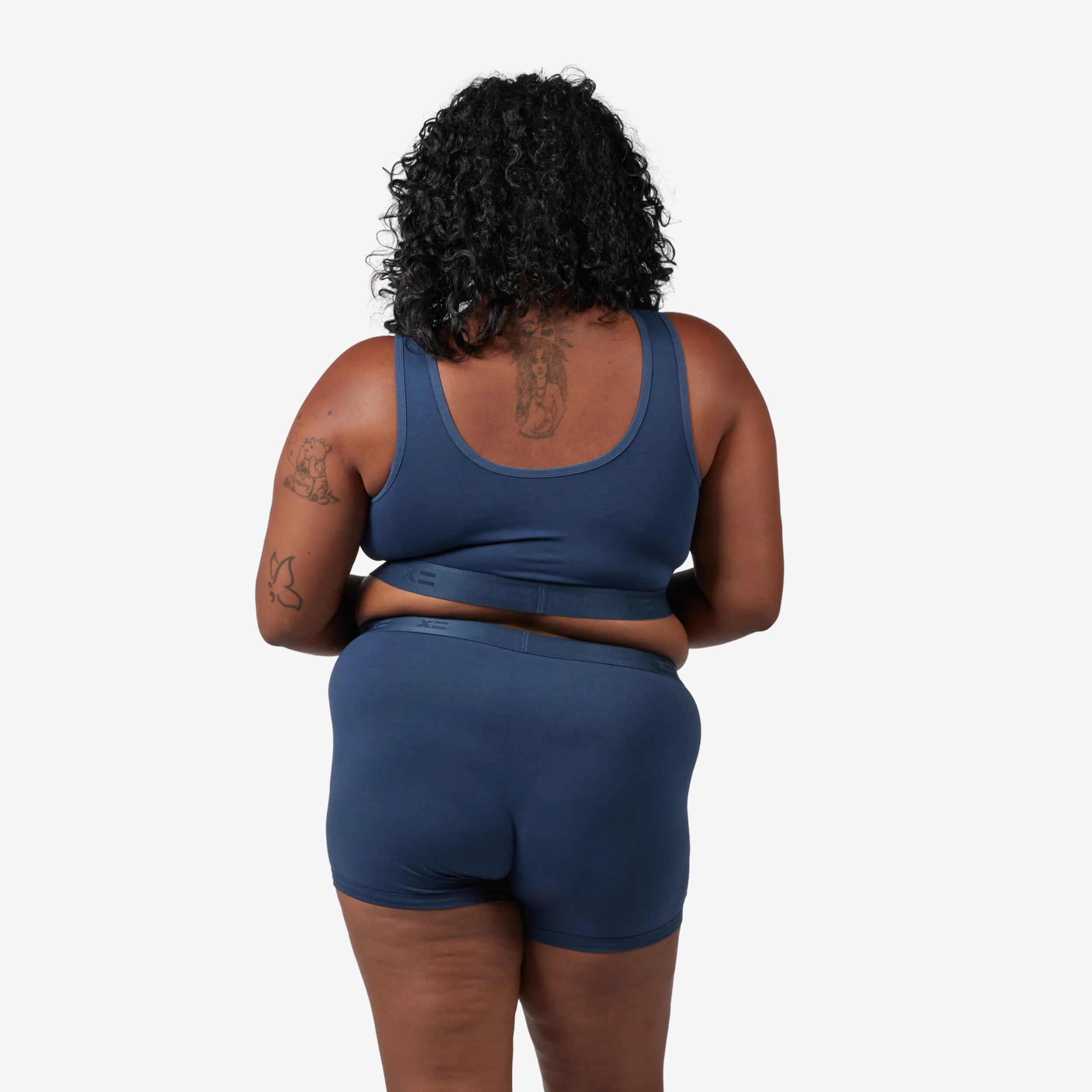 Model: Maliyah is 5'7" and wears a 2X