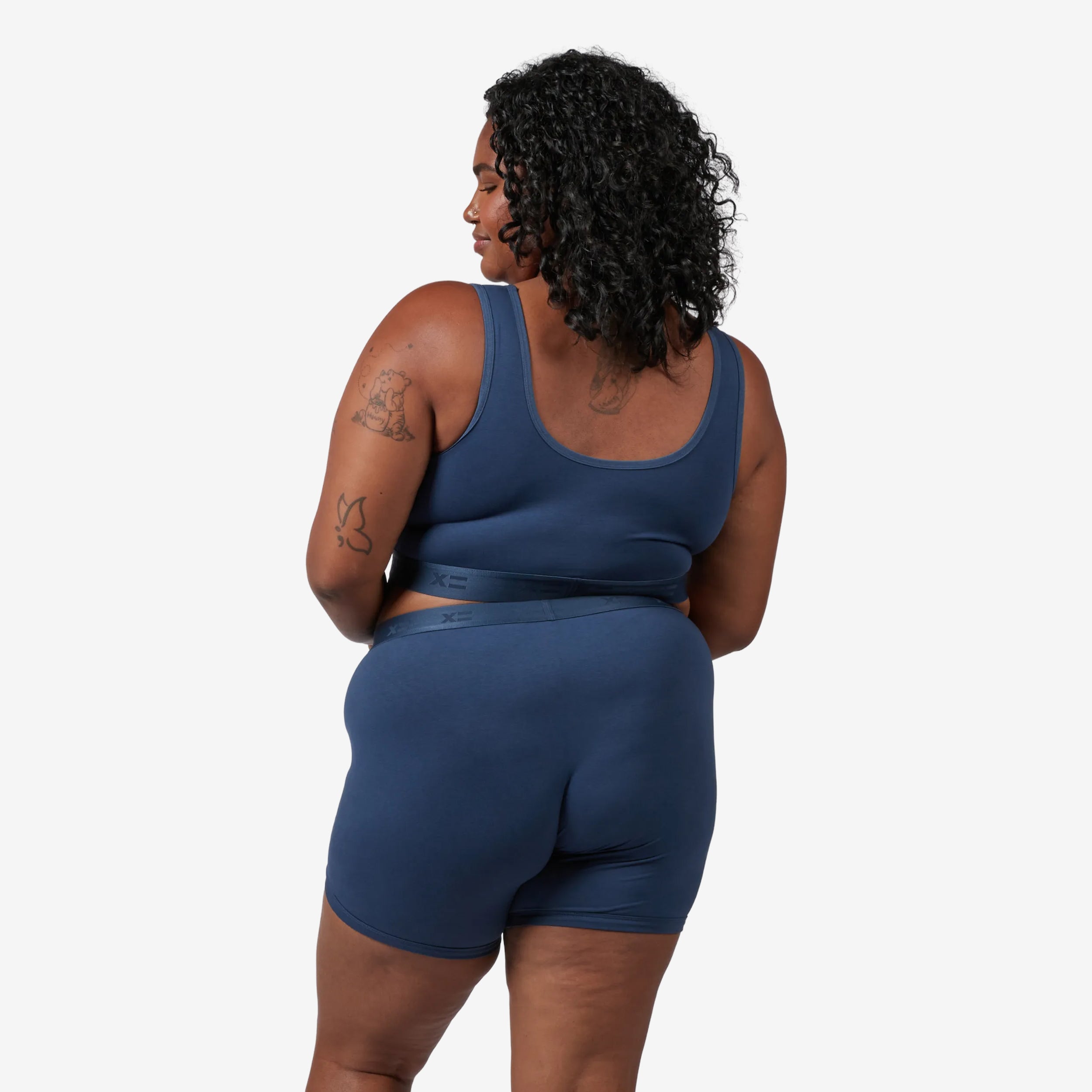 Model: Maliyah is 5'7" and wears a 2X