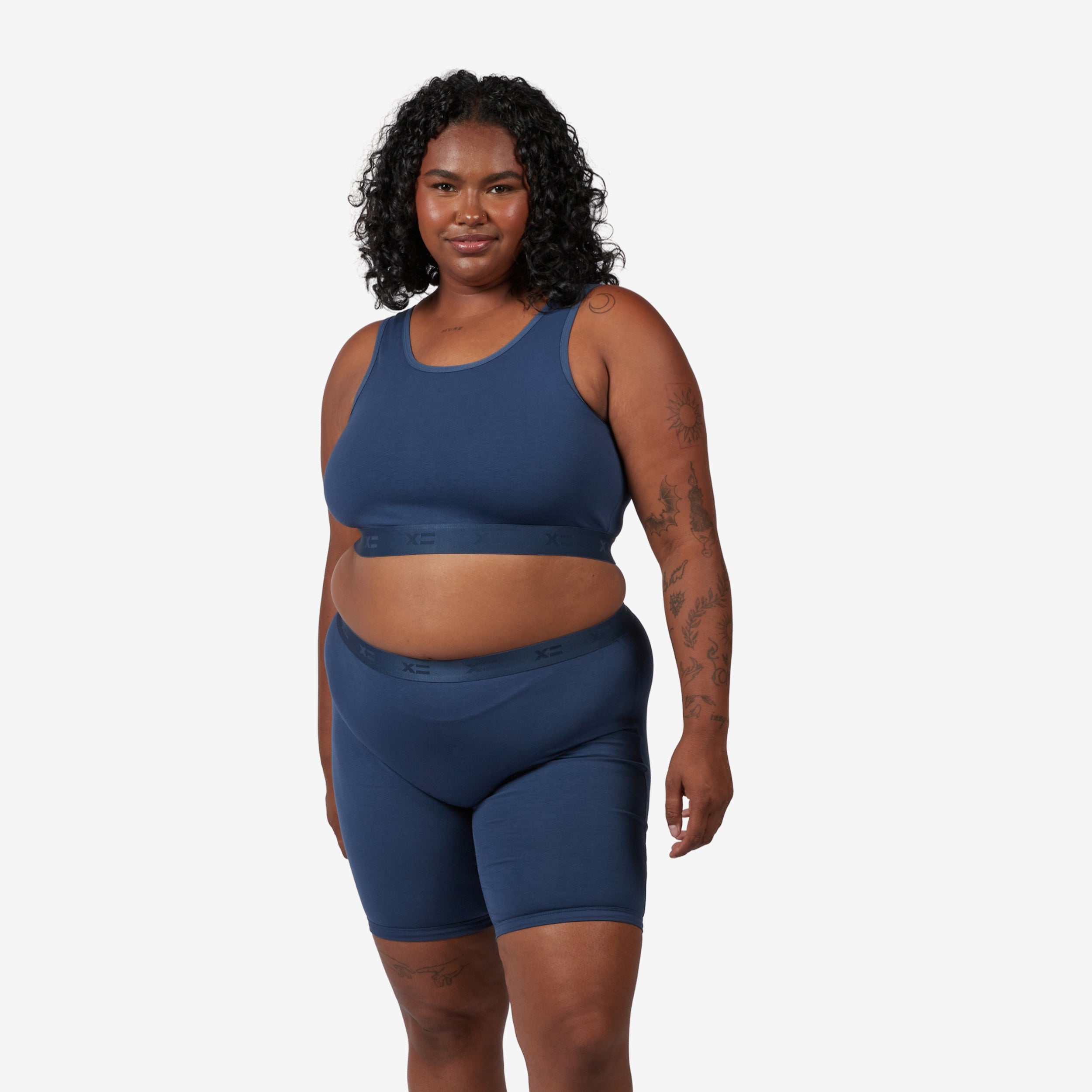 Model: Maliyah is 5'7" and wears a 2X