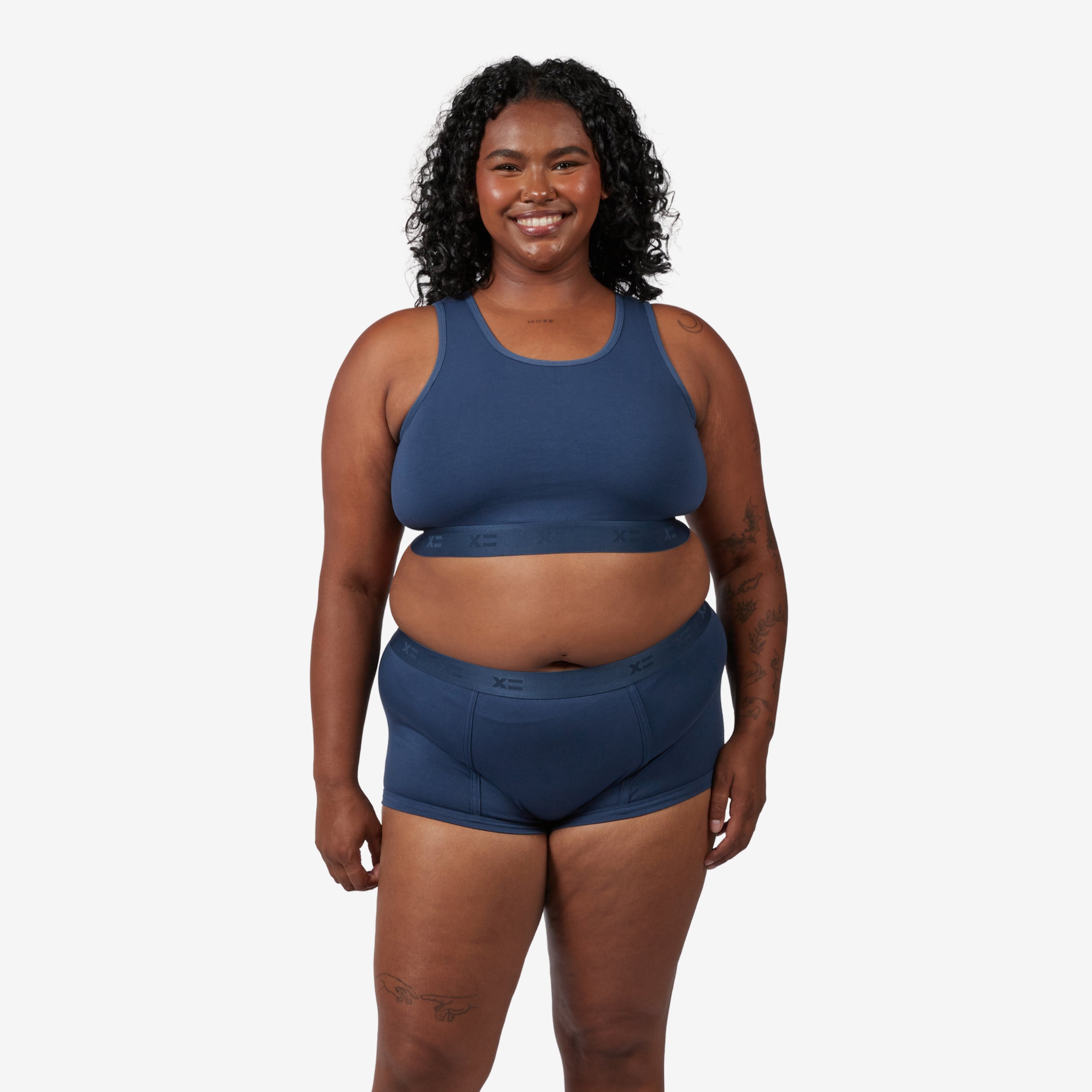 Model: Maliyah is 5'7" and wears a 2X