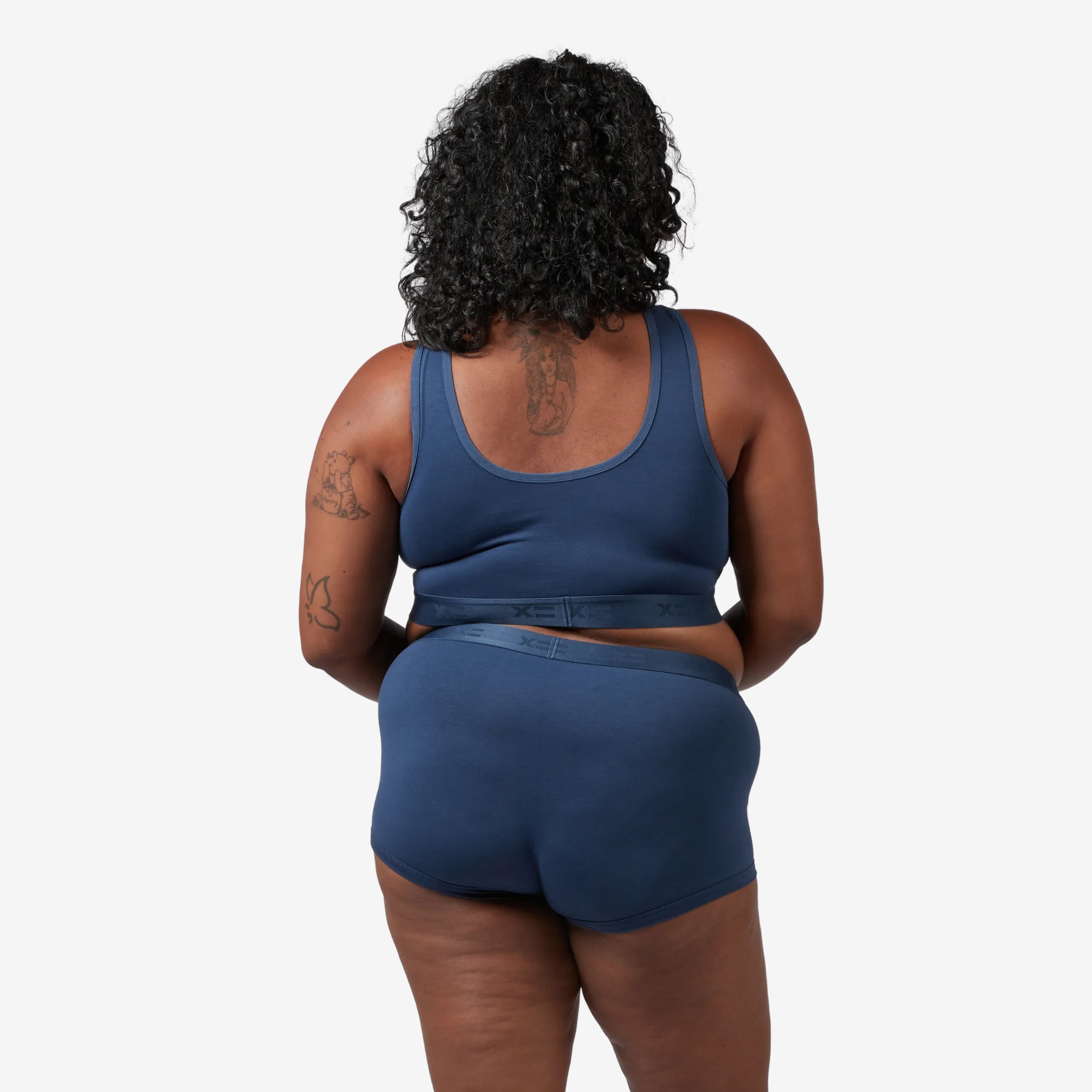 Model: Maliyah is 5'7" and wears a 2X
