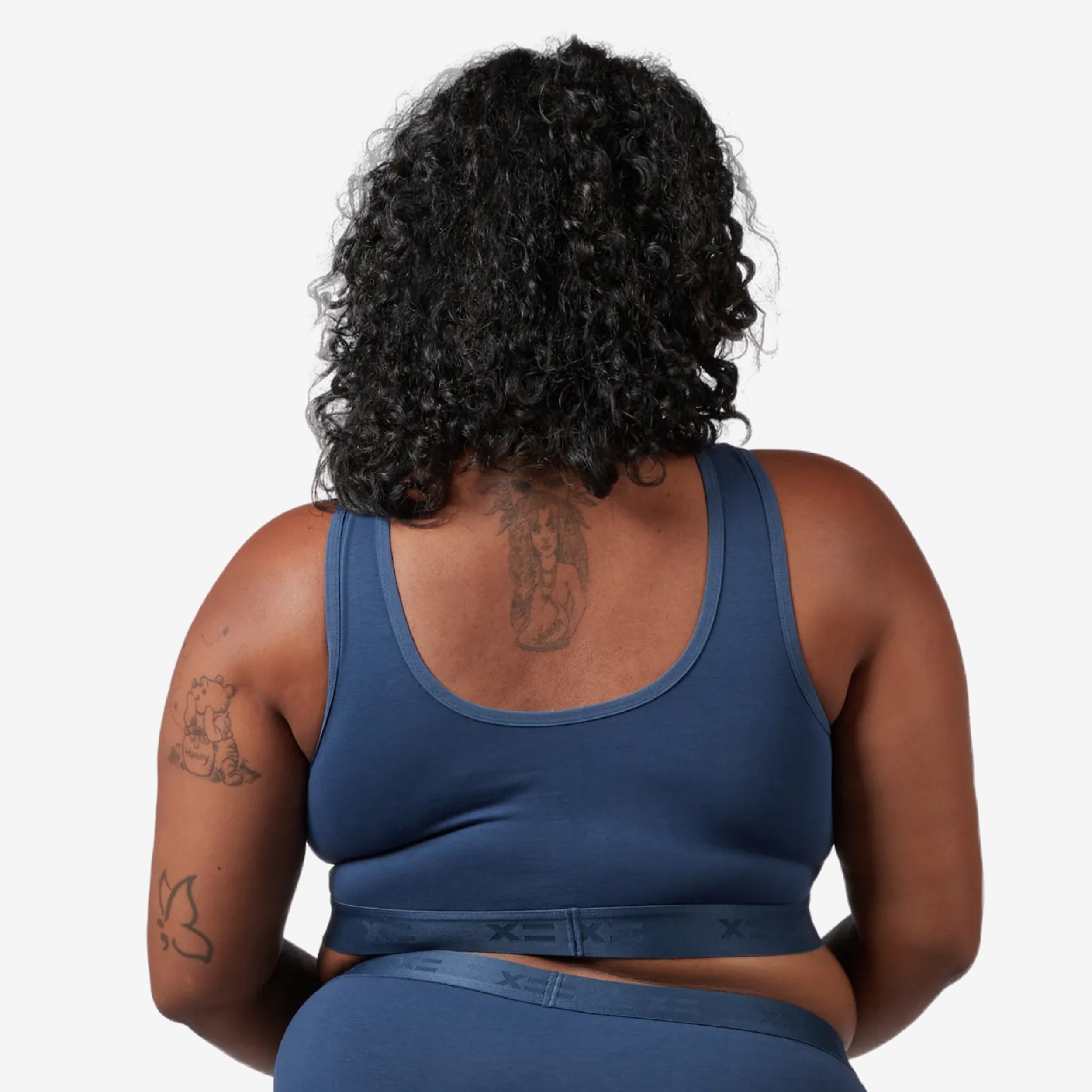 Model: Maliyah is 5'7" and wears a 2X