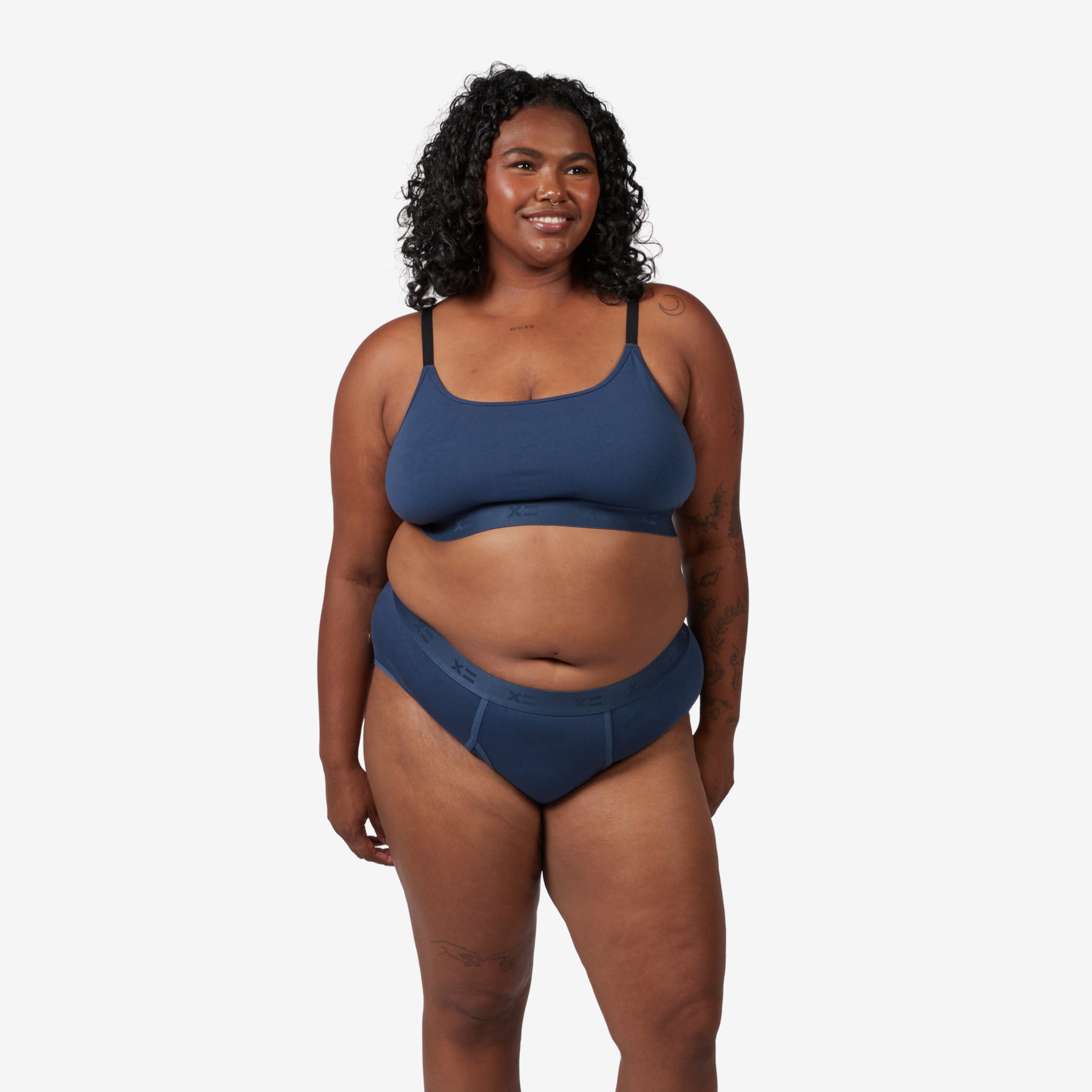 Model: Maliyah is 5'7" and wears a 2X