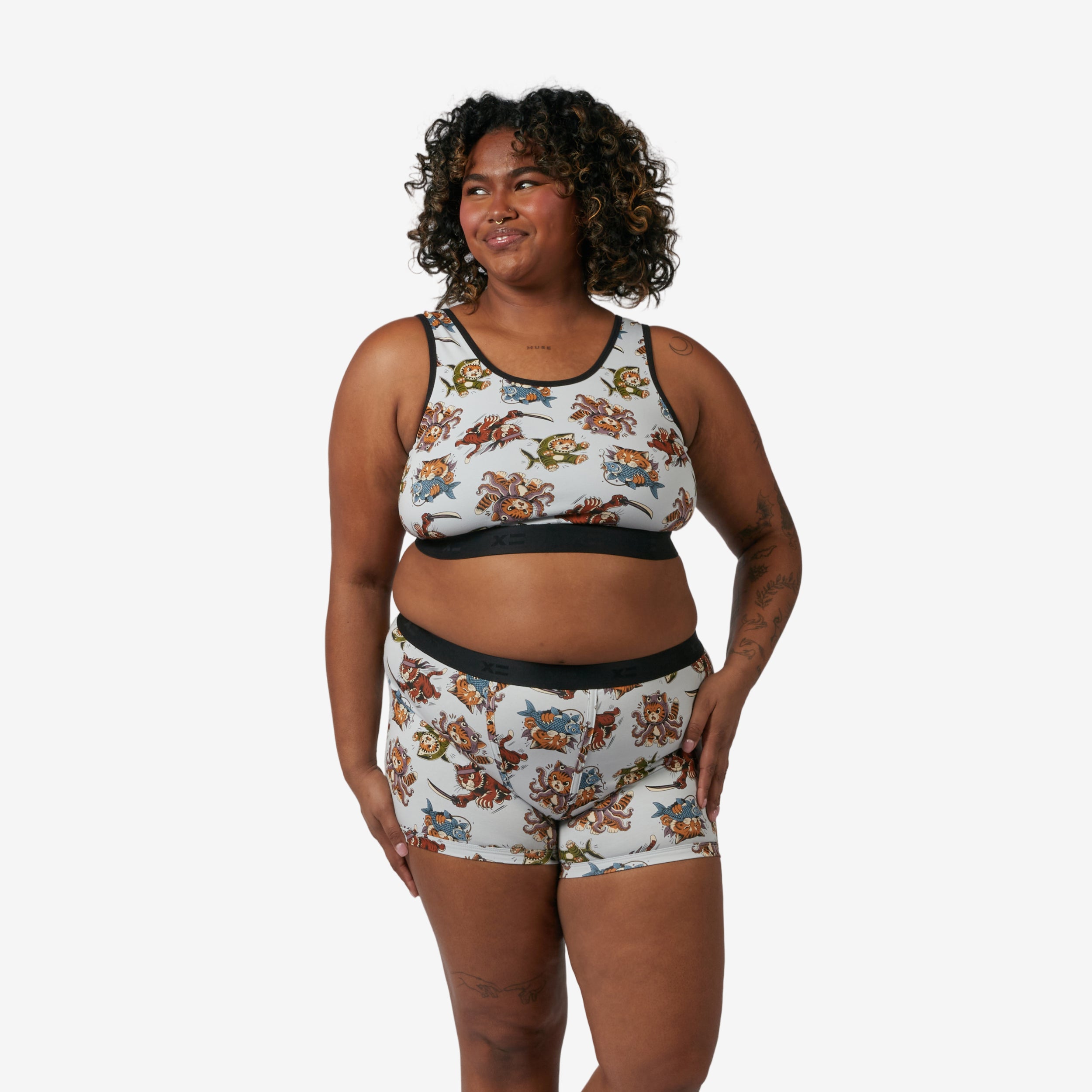 Model: Maliyah is 5'7" and wears a 2X