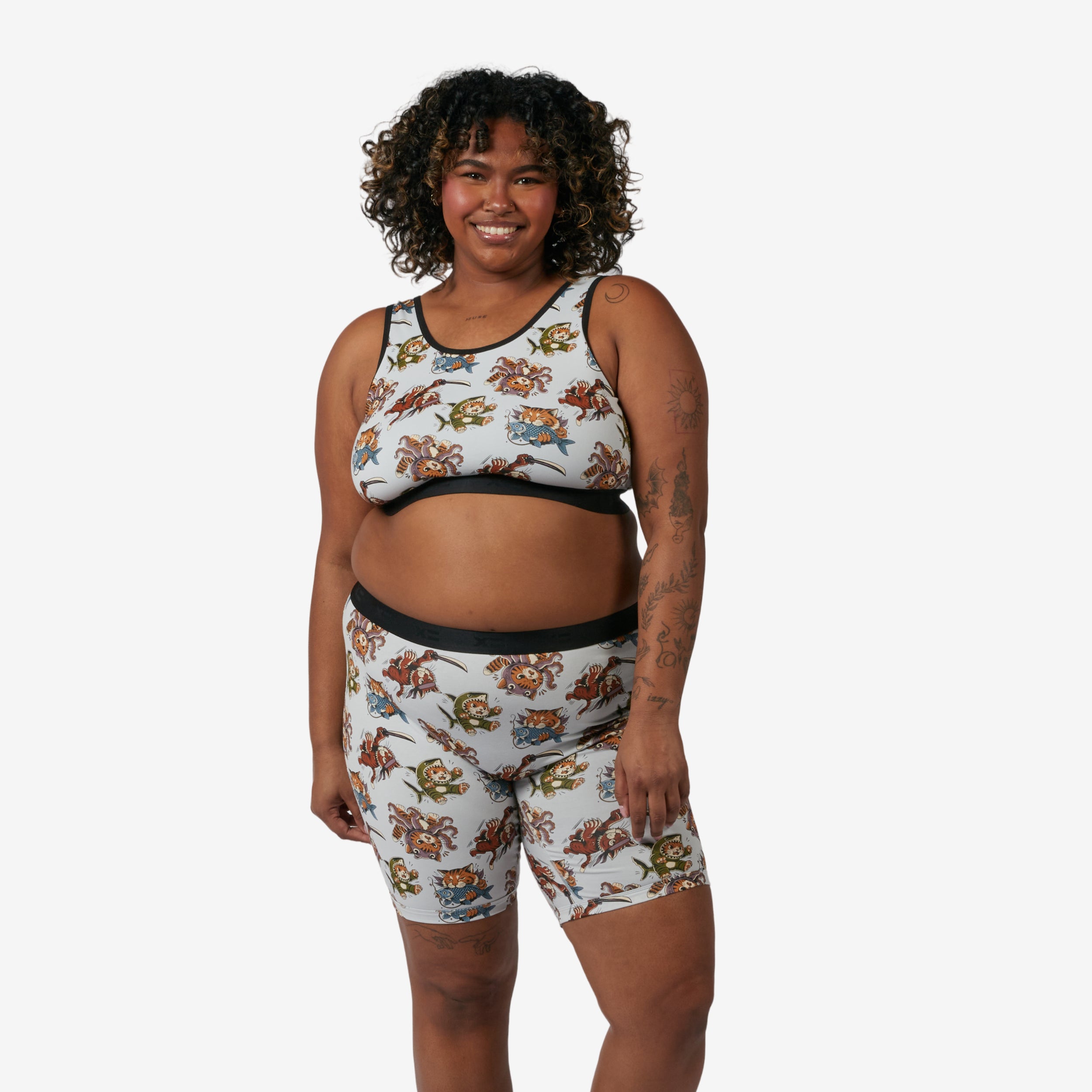 Model: Maliyah is 5'7" and wears a 2X