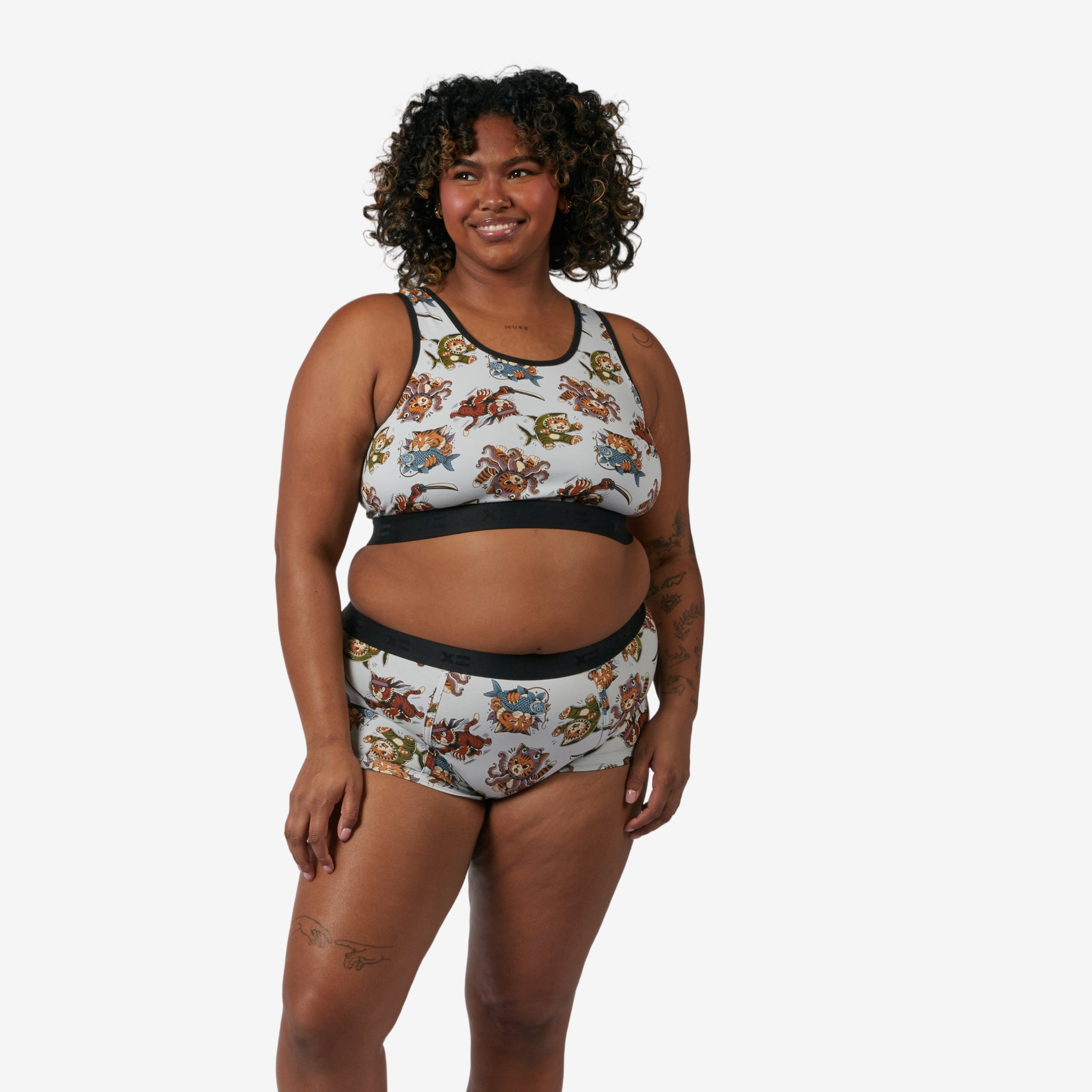 Model: Maliyah is 5'7" and wears a 2X