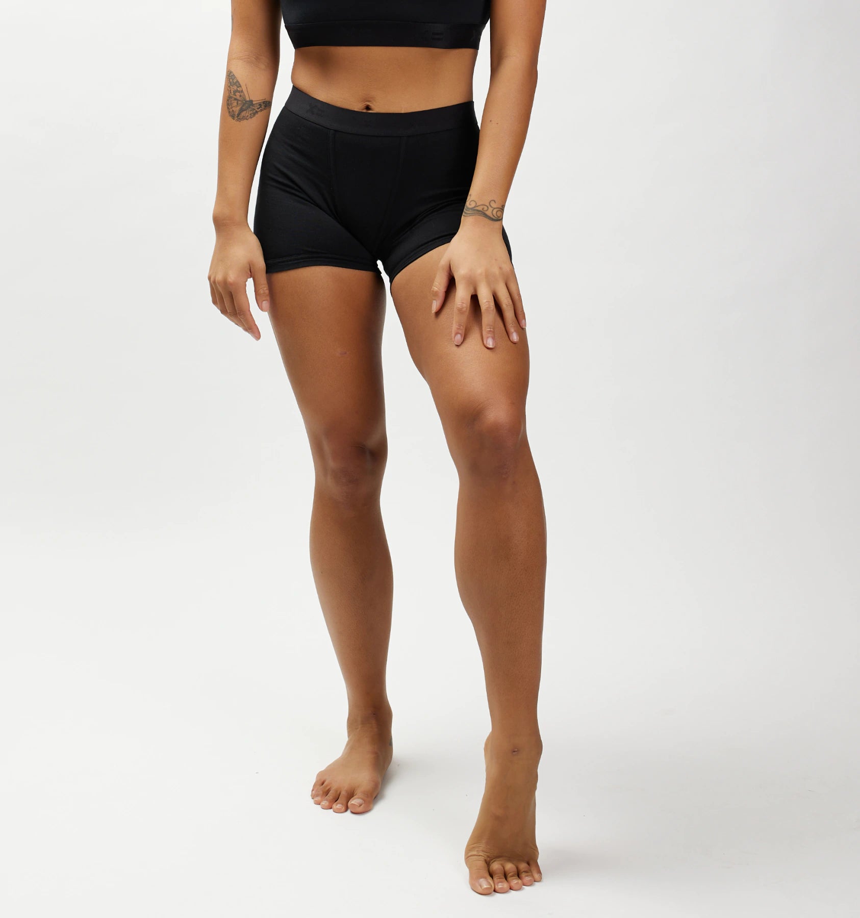 Raiza is 5'6" and wears a small